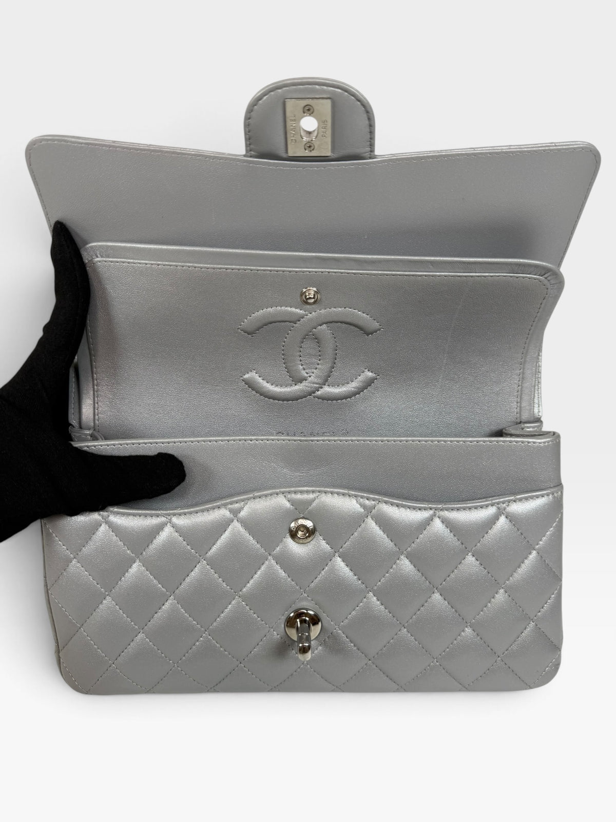 Chanel Medium Classic Double Flap In Silver Lambskin Leather Silver Hardware. 100% authentic and preloved in excellent condition