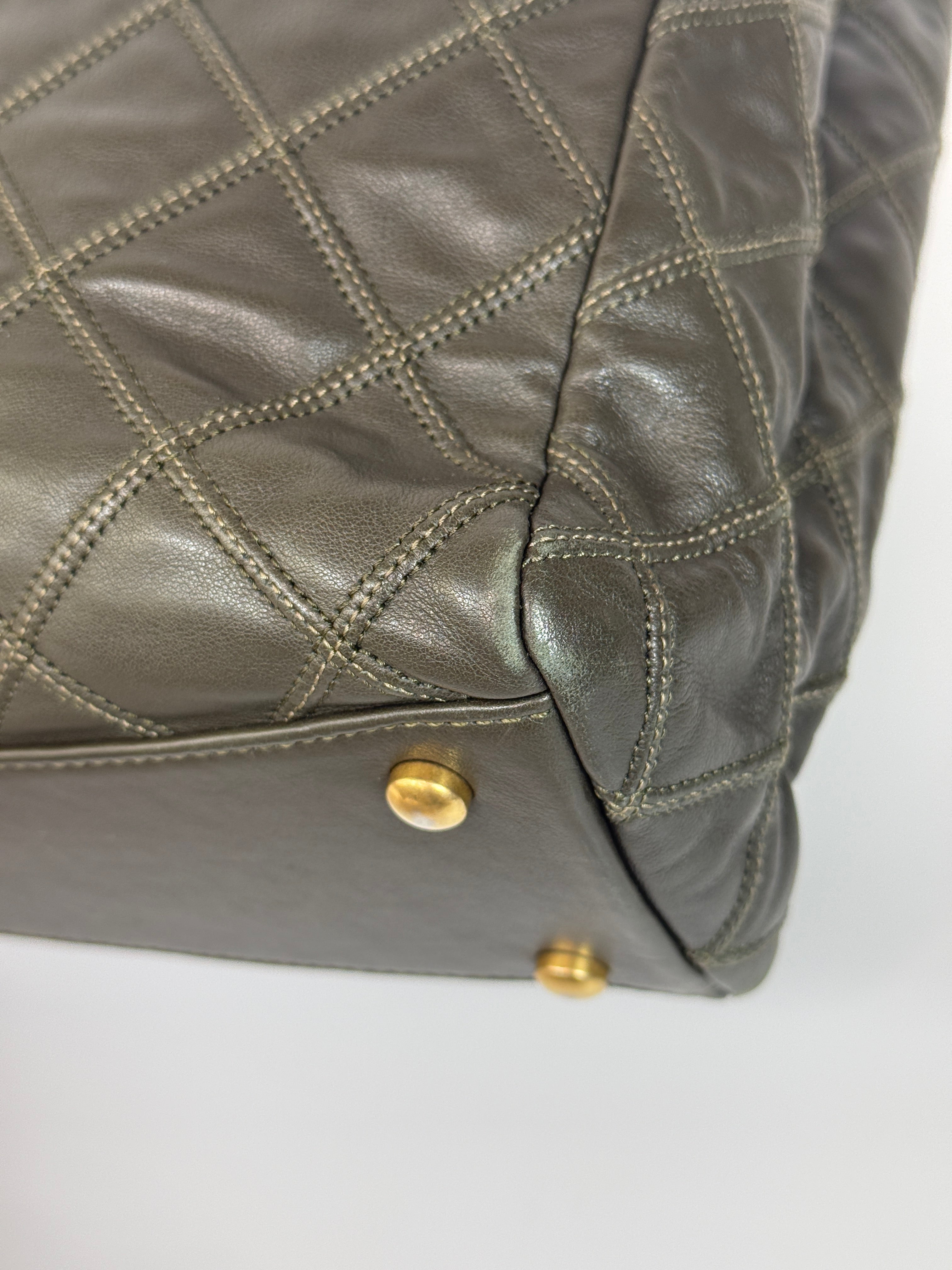 Authentic and preloved Chanel Dark Green Lambskin Leather Tote Bag With Gold Hardware very good condition. 100% Authenticity Guarantee