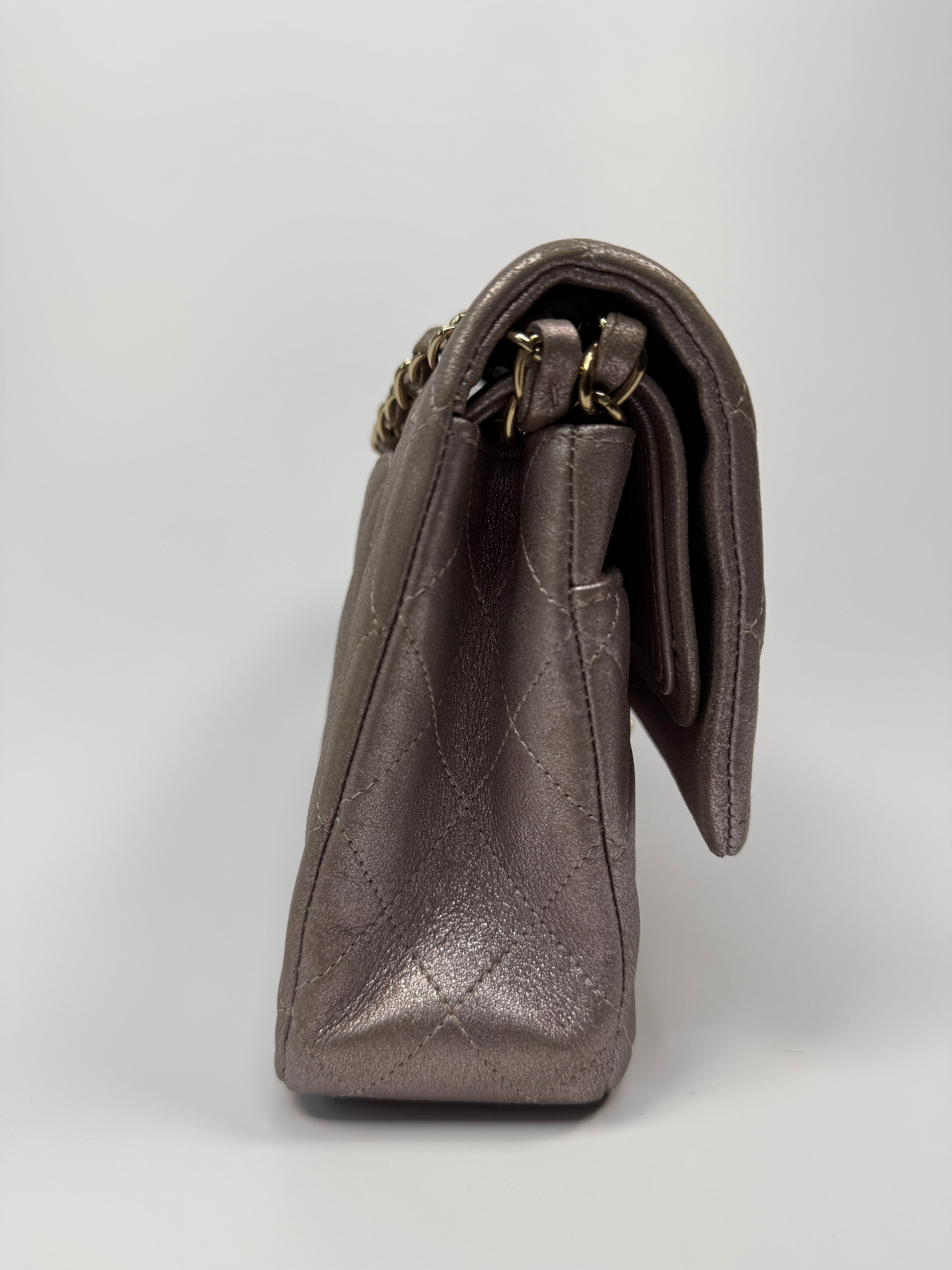 Authentic pre-loved Chanel Iridescent Rose Medium Classic Double Flap With Gold Hardware.