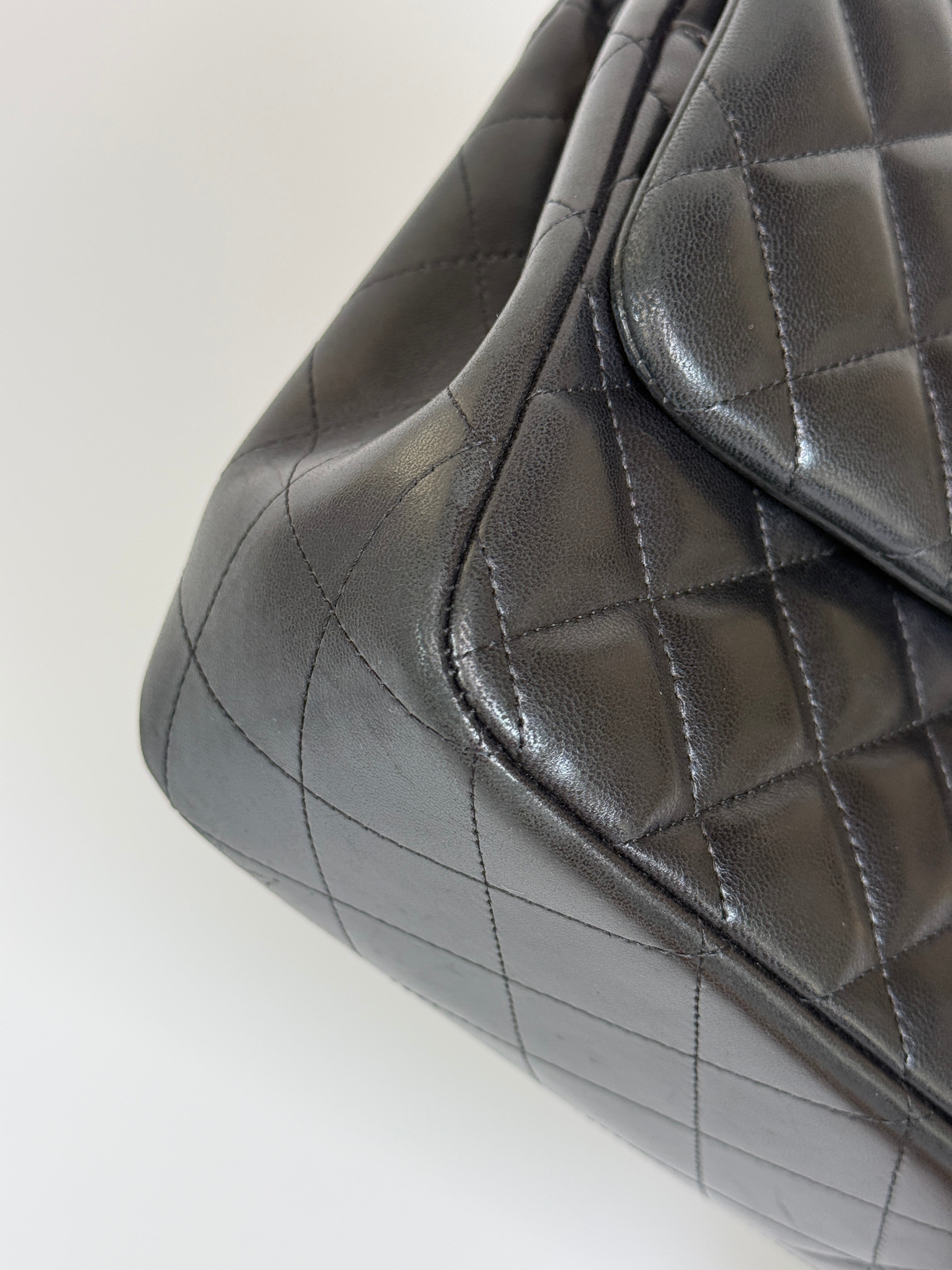 Authentic and preloved Chanel Jumbo Classic Flap Bag In Black Lambskin Leather With GOLD Hardware. Excellent condition. 100% Authenticity Guarantee