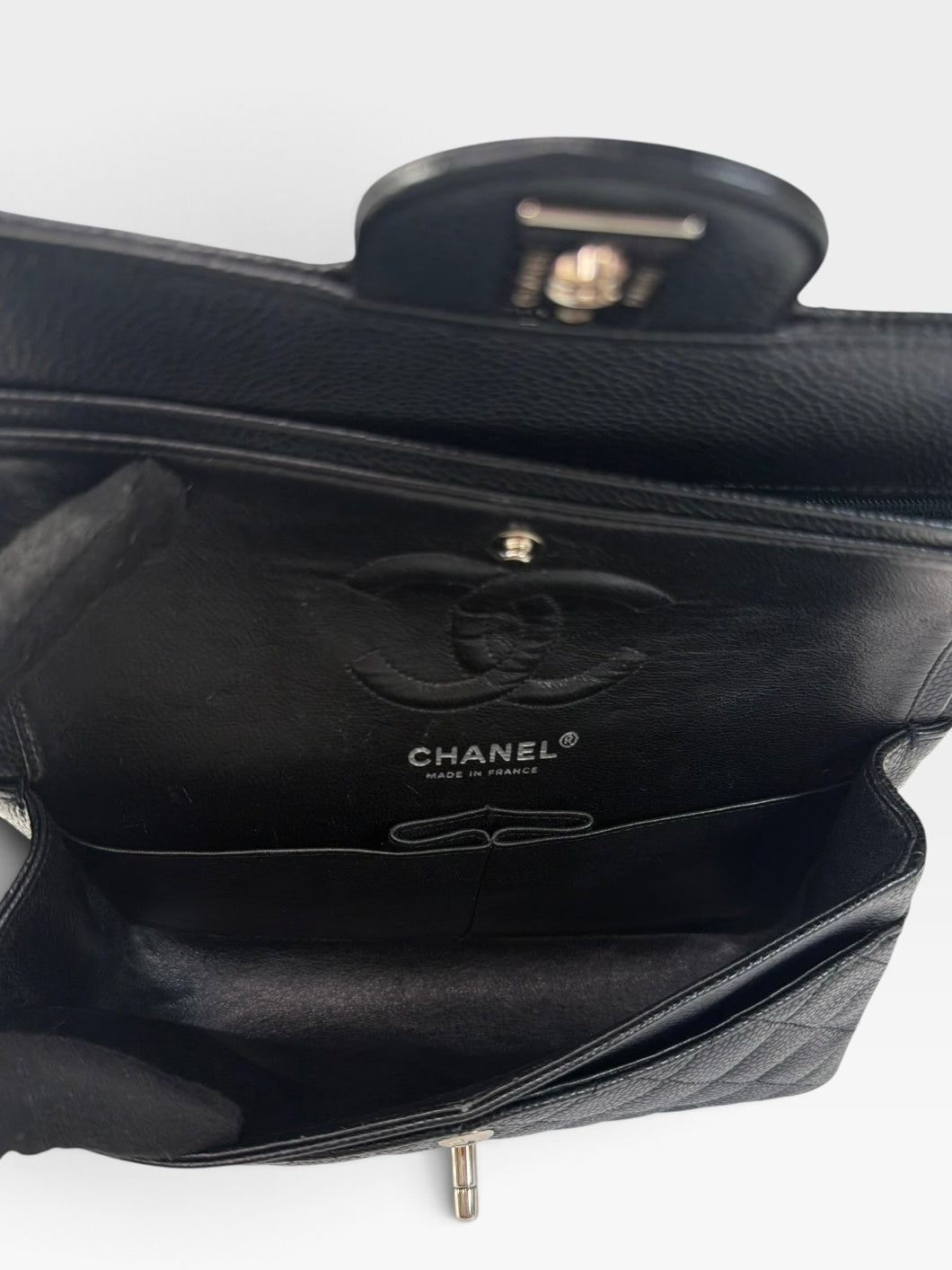 Chanel Vintage Small Classic Double Flap In Black Caviar Leather With Silver Hardware. 100% authentic and preloved in excellent condition