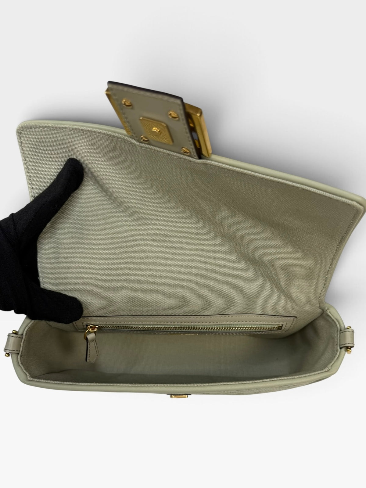 Fendi Baguette In Green Tea FF Monogram Fabric and Canvas With Gold Hardware. 100% authentic and preloved in excellent condition