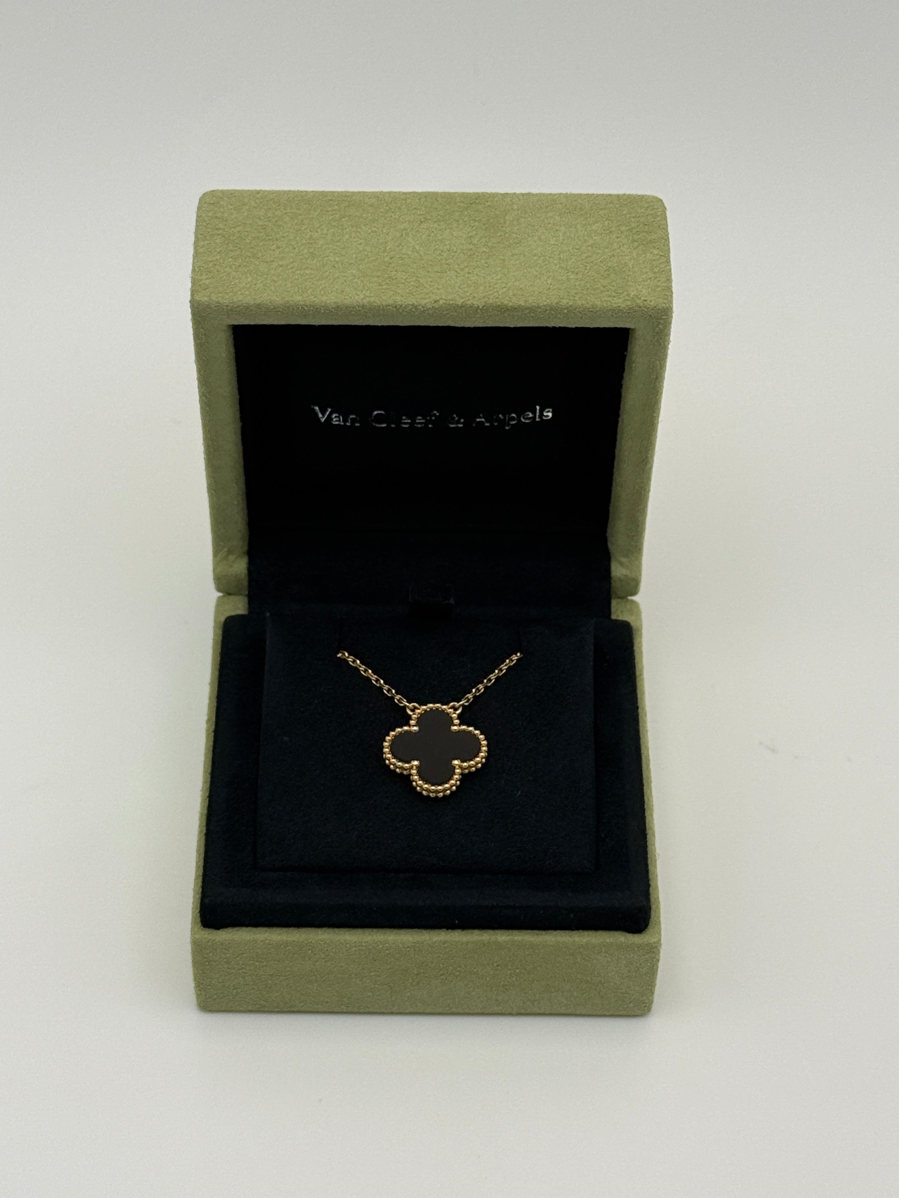 Van Cleef & Arpels Vintage Alhambra Gold And Onyx Pendant