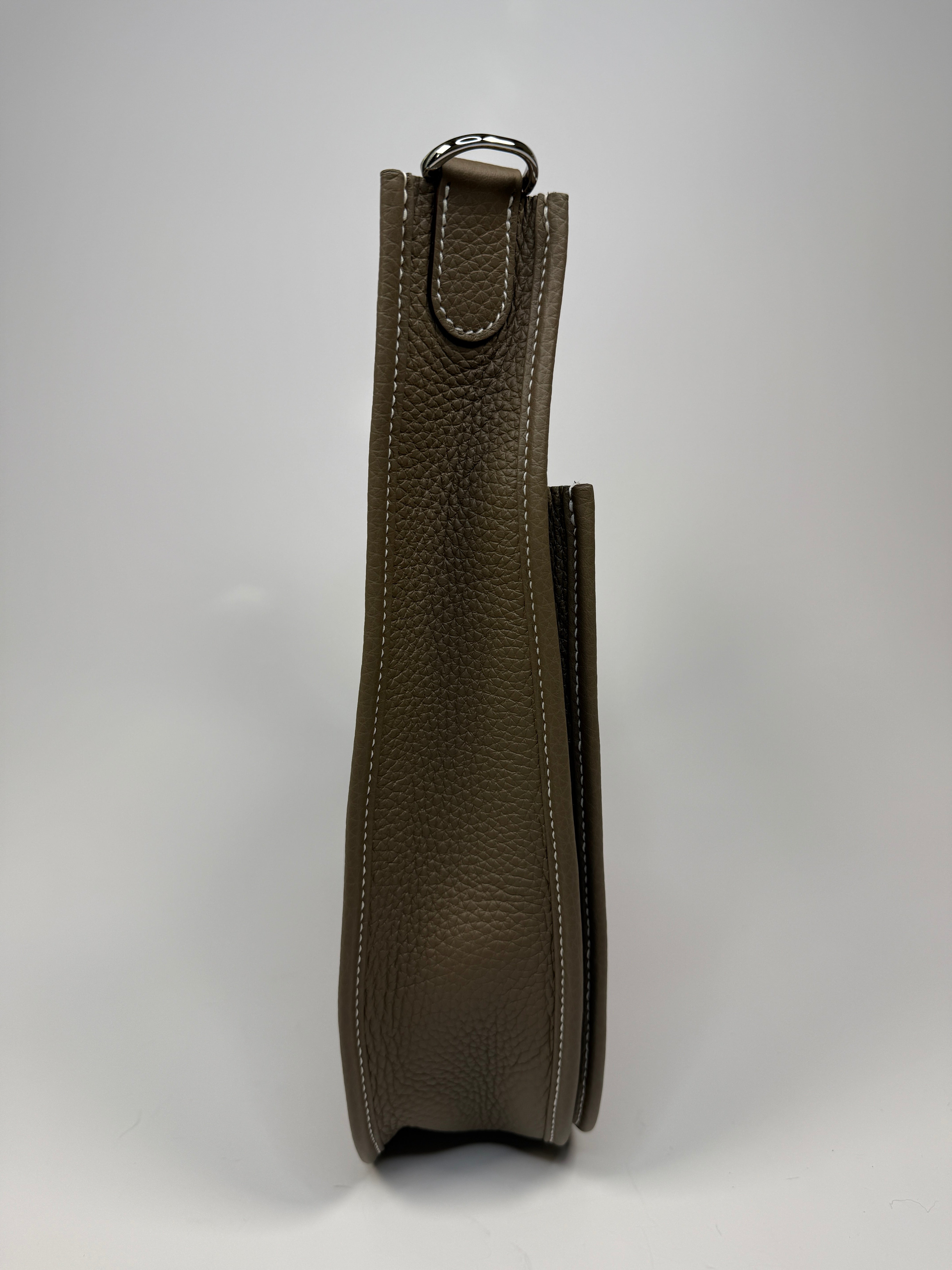 Hermès Evelyne 29 In Etoupe Clemence Leather With Palladium Hardware. New condition. Authentic and preloved