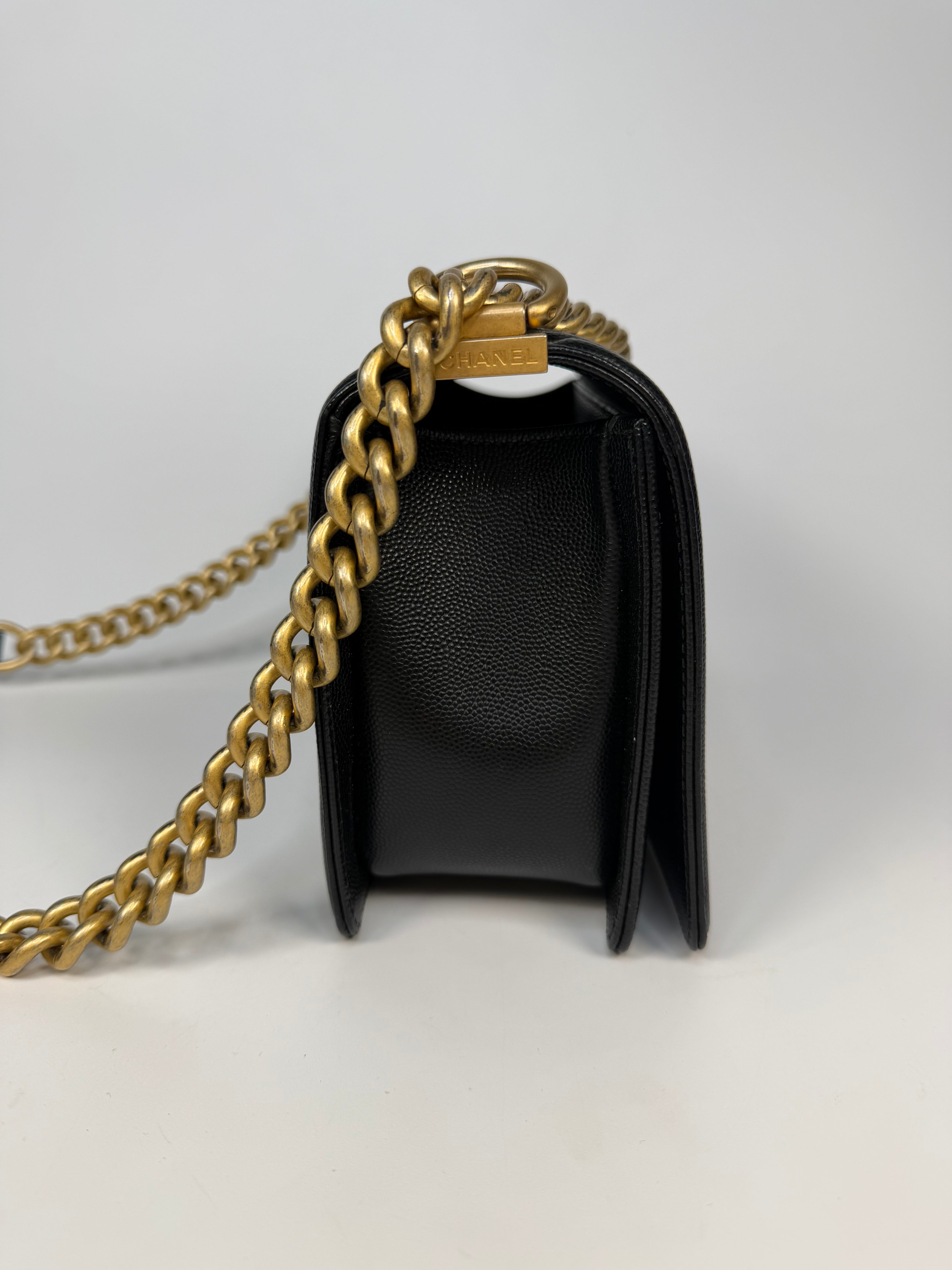 Chanel Boy Bag In Black Caviar Leather With Gold Hardware. Authentic and preloved in excellent condition. Insured next day delivery. Verified by Luxe Cheshire