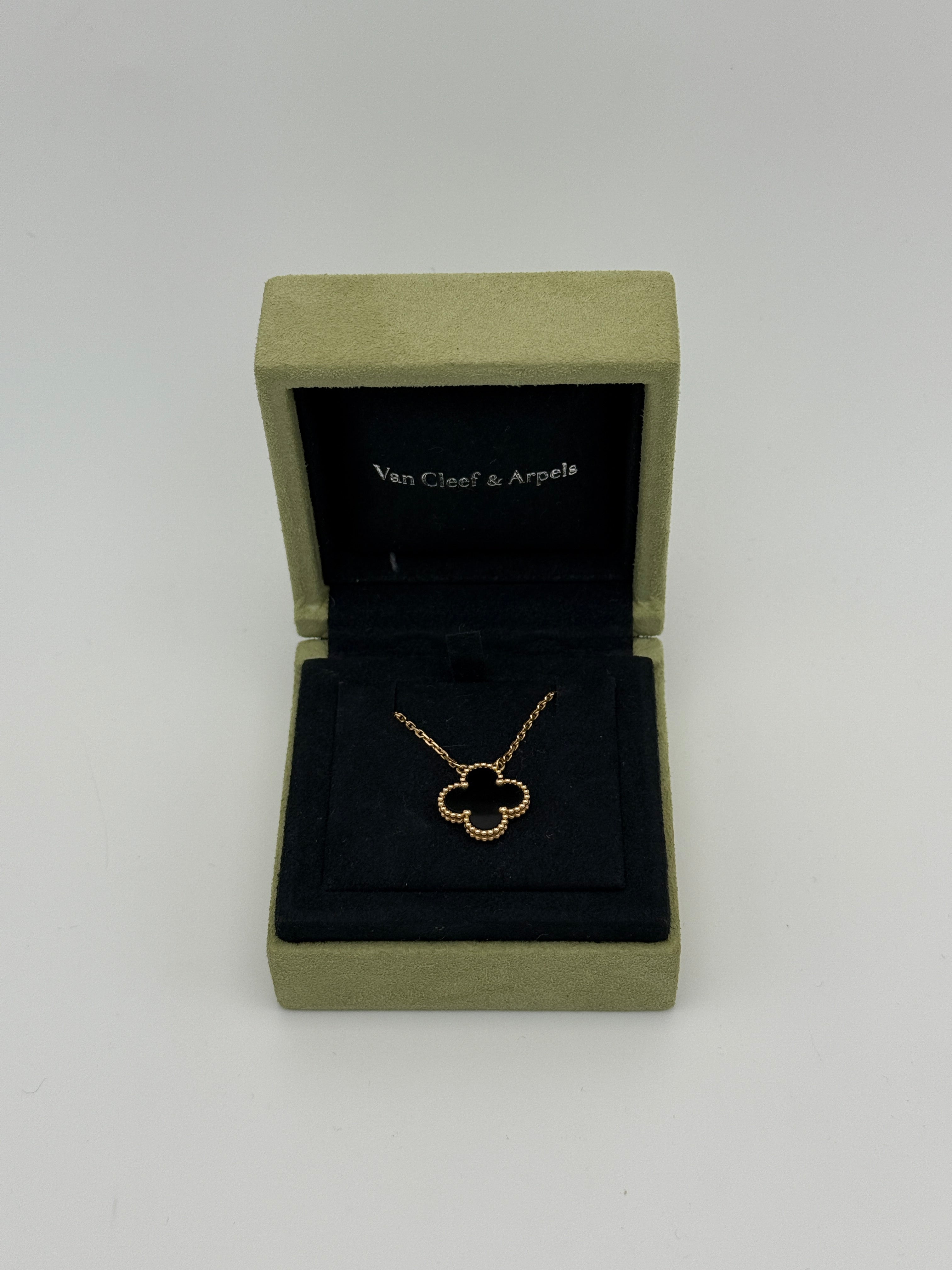 Van Cleef & Arpels Vintage Alhambra Onyx Pendant Authentic and preloved in excellent condition