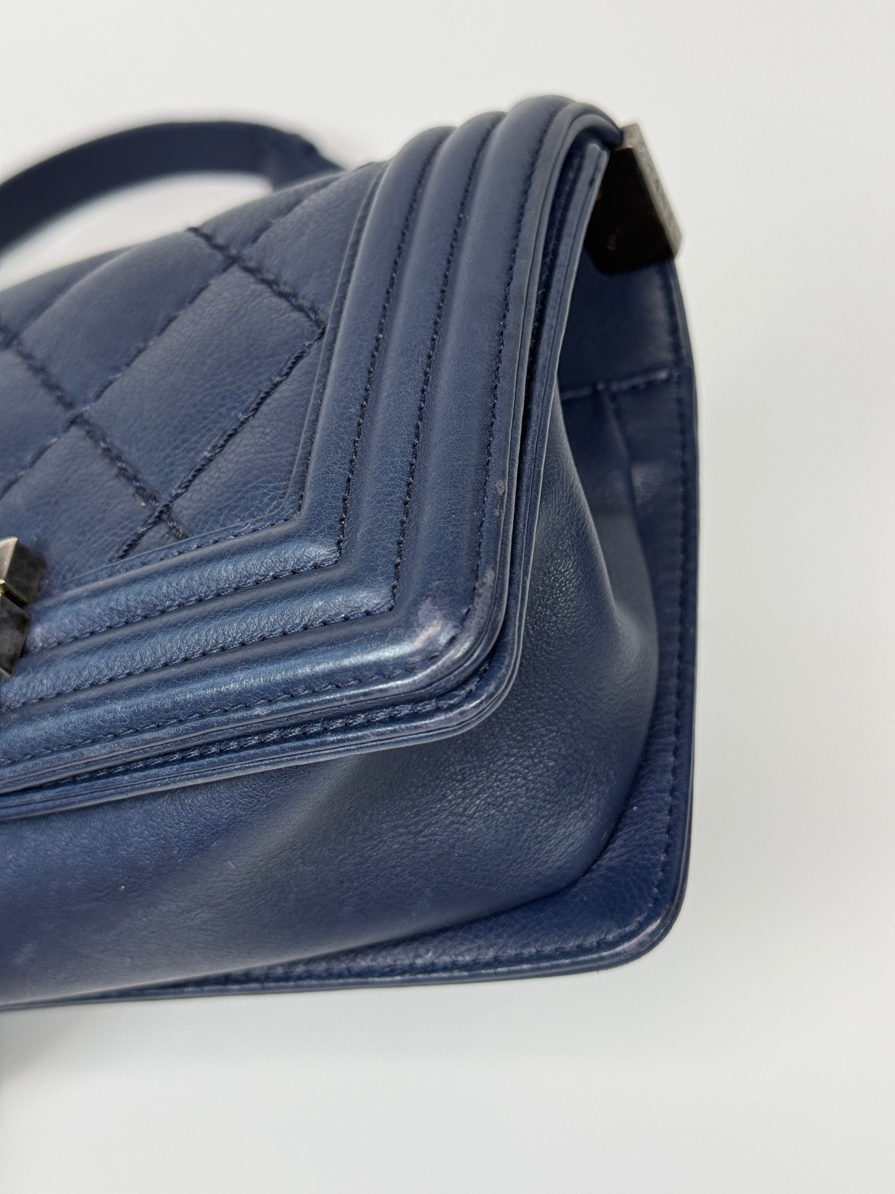 Chanel Mini Boy Bag In Navy Lambskin With Ruthenium Hardware In Excellent Condition.
Authentic Pre Loved Verified by Luxe Cheshire Trusted Designer resale