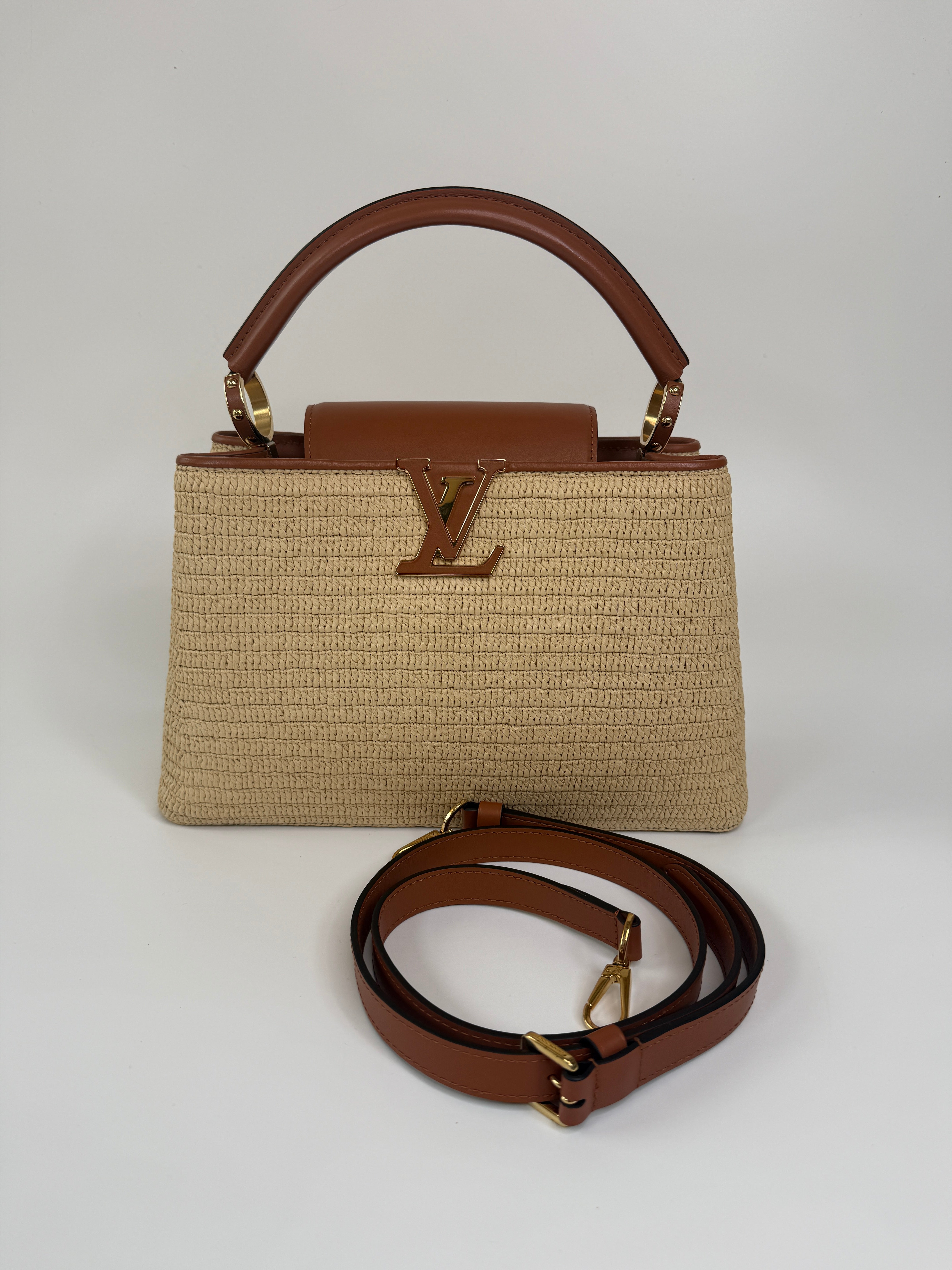 Louis Vuitton Capucines MM Bag In Raffia. Excellent Preloved condition. 100% Authenticity guarantee.