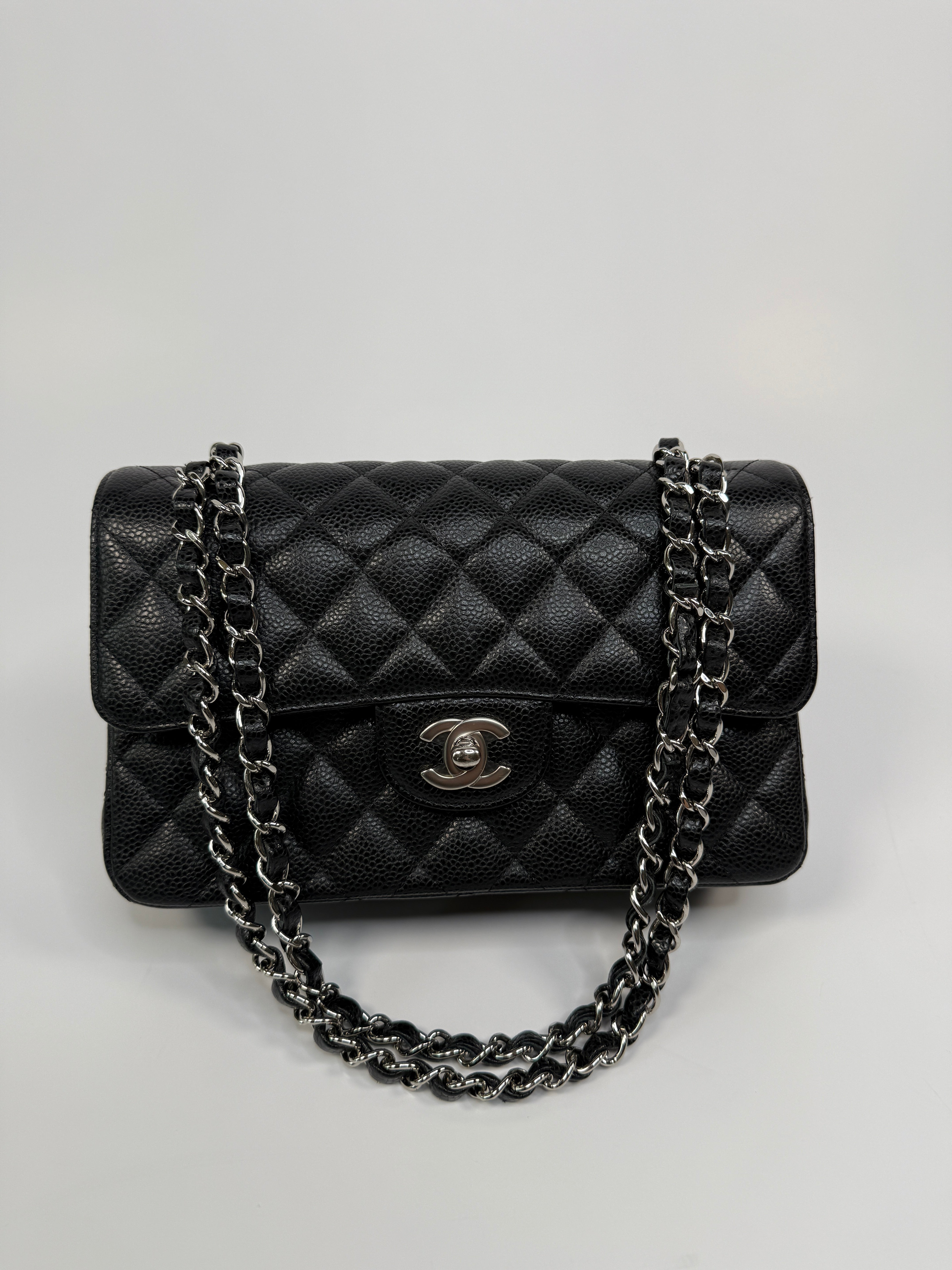 Chanel Small Classic Double Flap In Black Caviar Leather With Silver Hardware
Pre Loved & Authentic