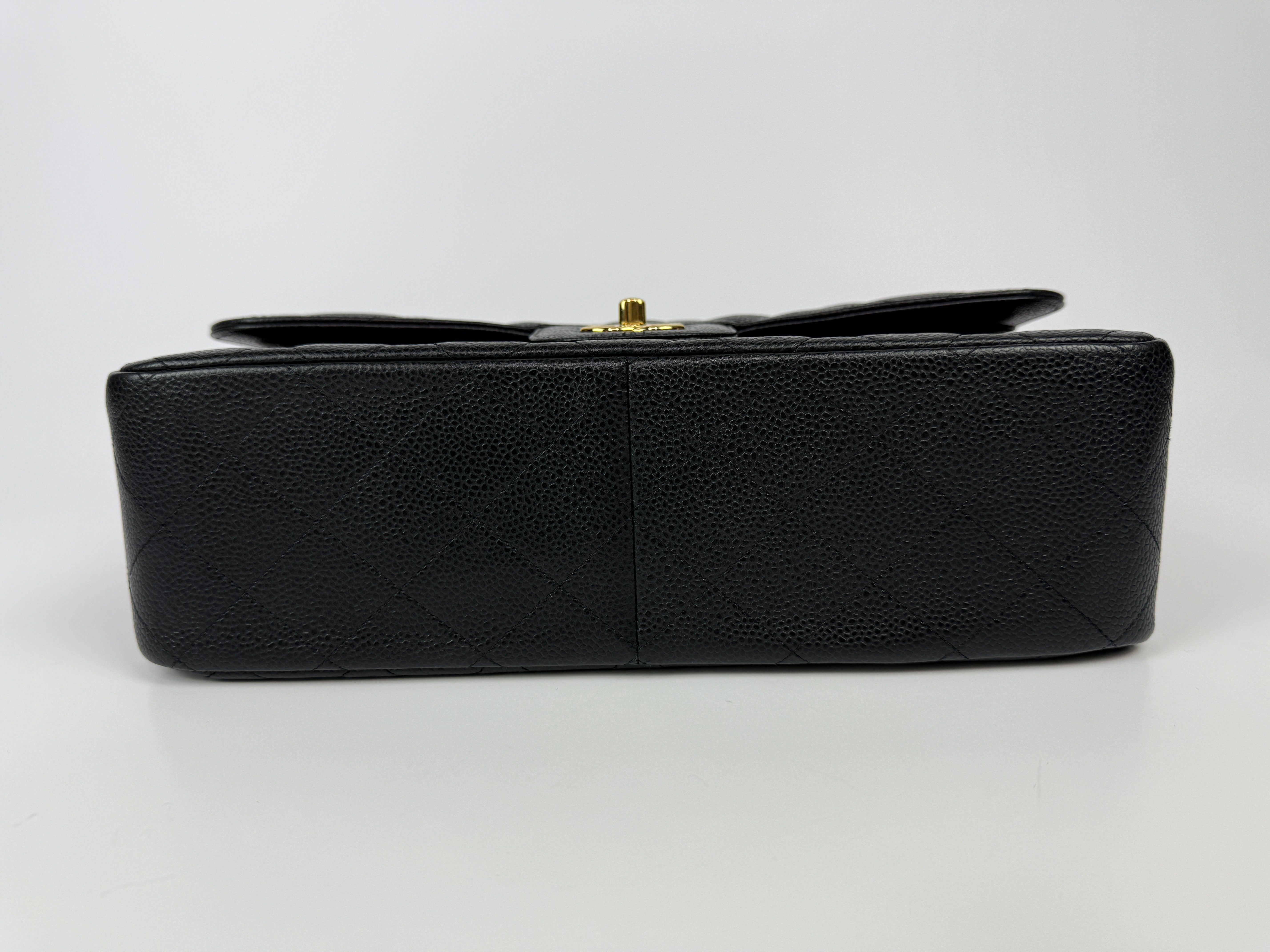Chanel Jumbo Classic Double Flap In Black Caviar Gold Hardware
Pre Loved & Authentic