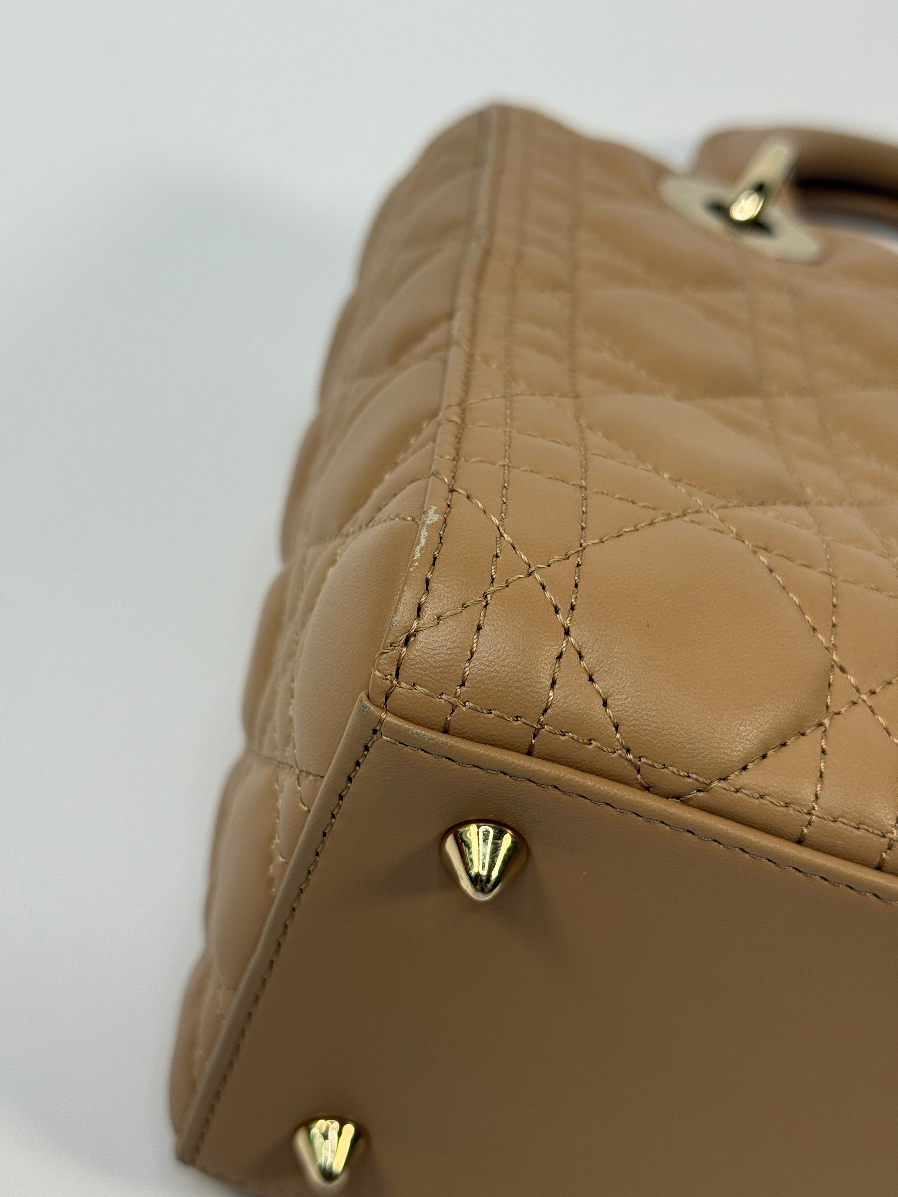 Authentic pre-loved Christian Dior Medium Lady Dior Bag in gold with gold hardware