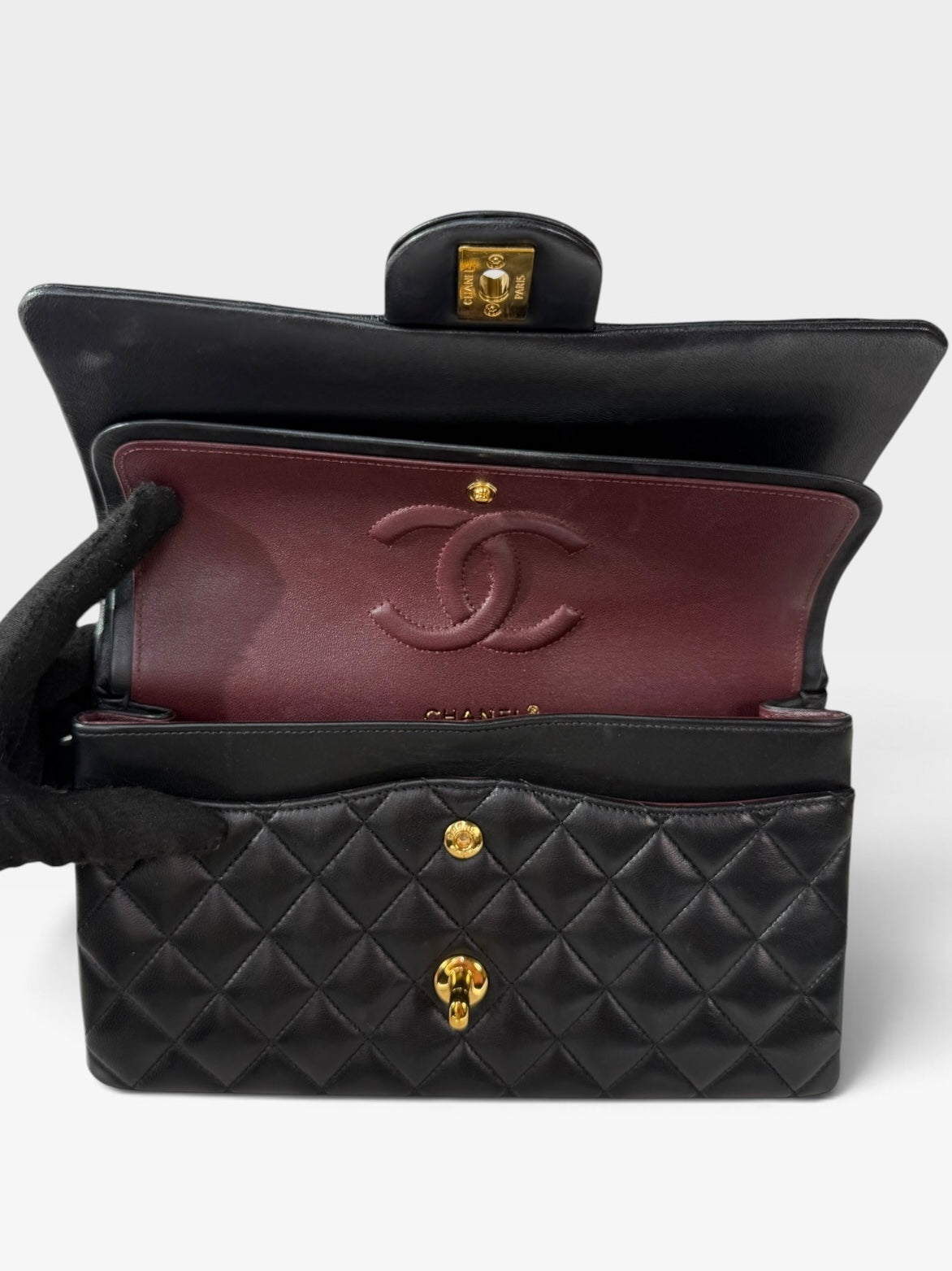 Chanel Medium Classic Double Flap In Black Lambskin Leather Gold Hardware. 100% authentic and preloved in excellent condition