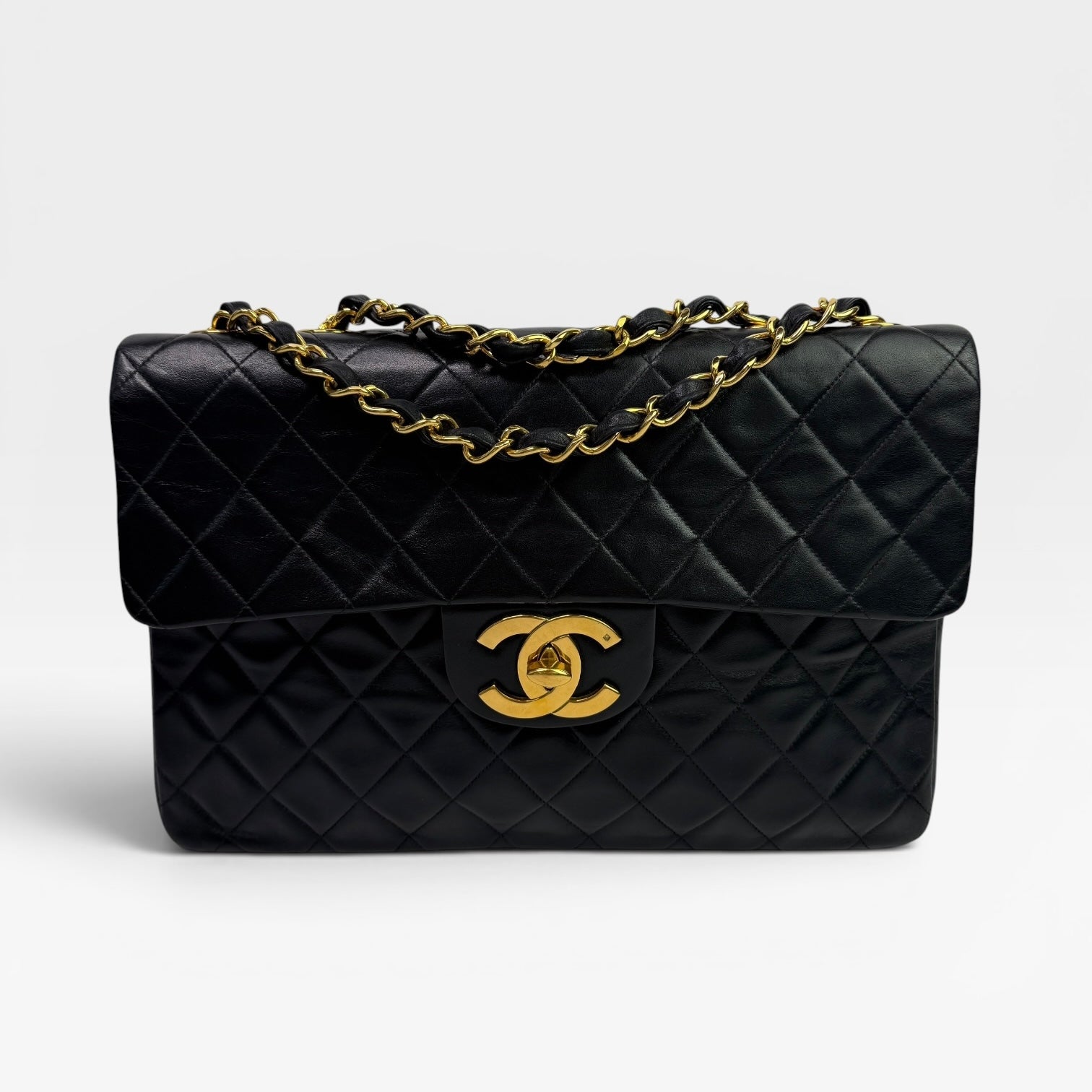 Chanel Vintage XL Maxi Flap Bag In Black Lambskin