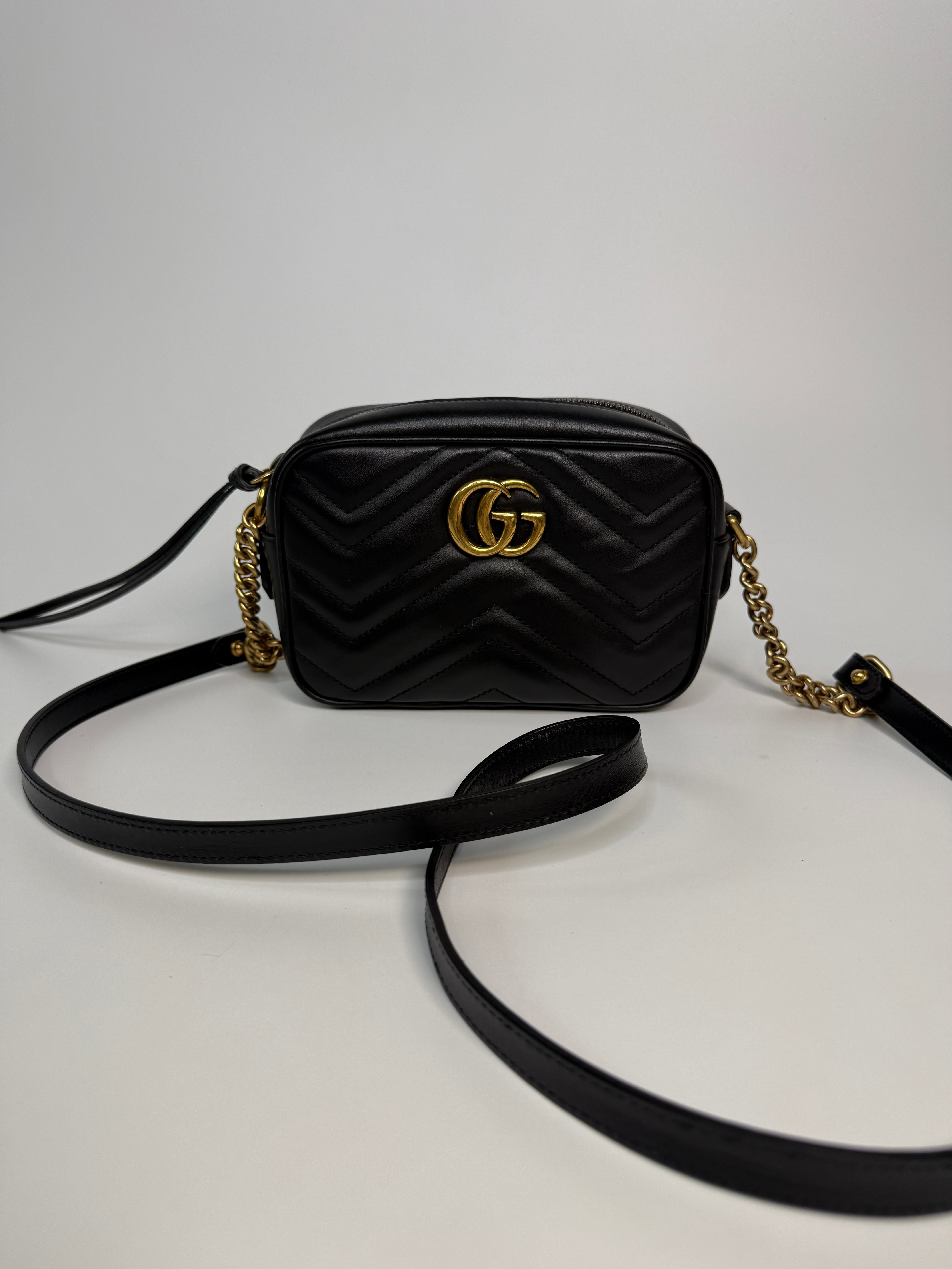 Gucci Small Marmont Camera Bag In Black Leather With Gold Hardware In Excellent Condition.
Authentic Pre Loved Verified by Luxe Cheshire Trusted Designer resale