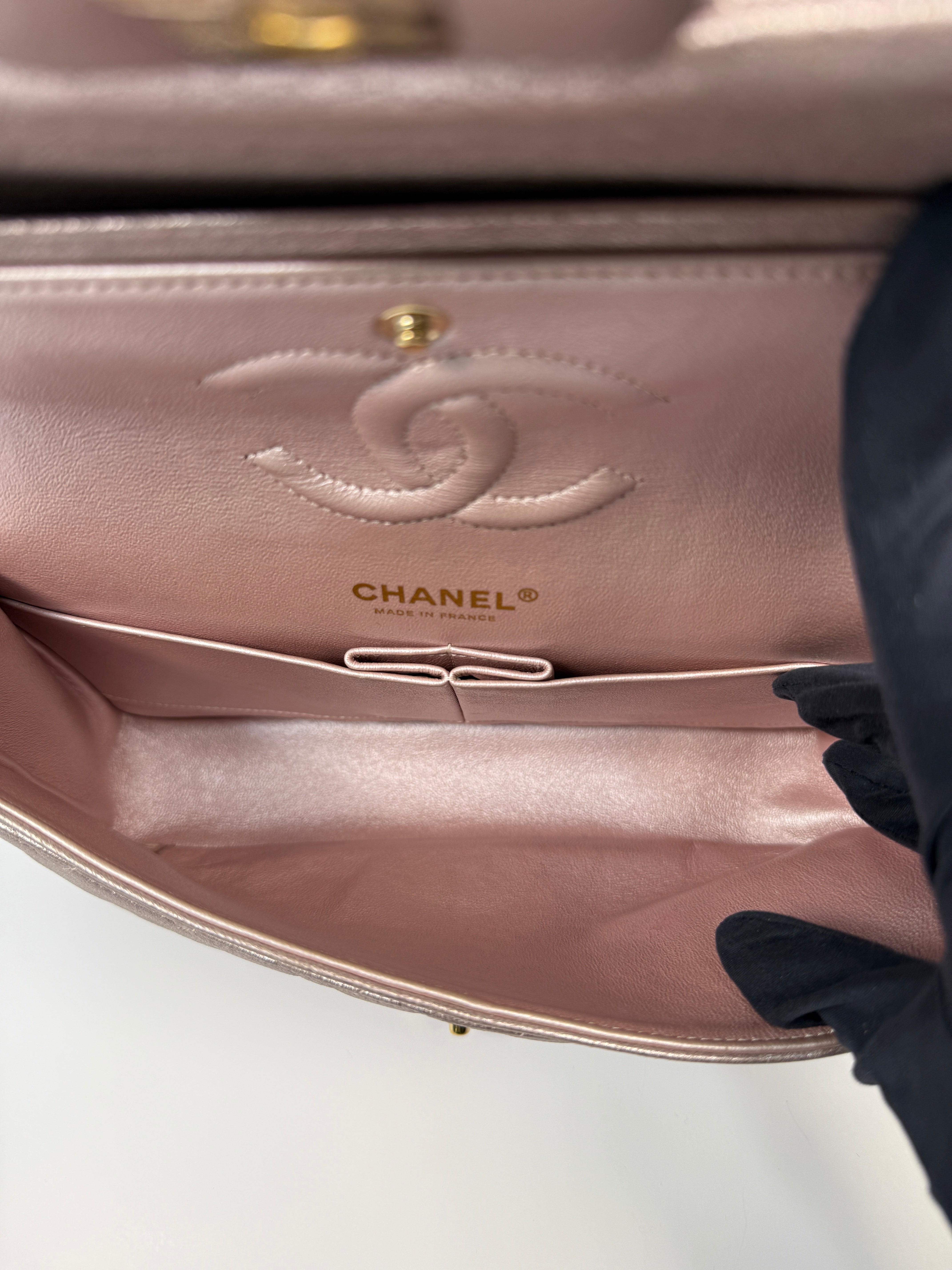 Authentic pre-loved Chanel Iridescent Rose Medium Classic Double Flap With Gold Hardware.