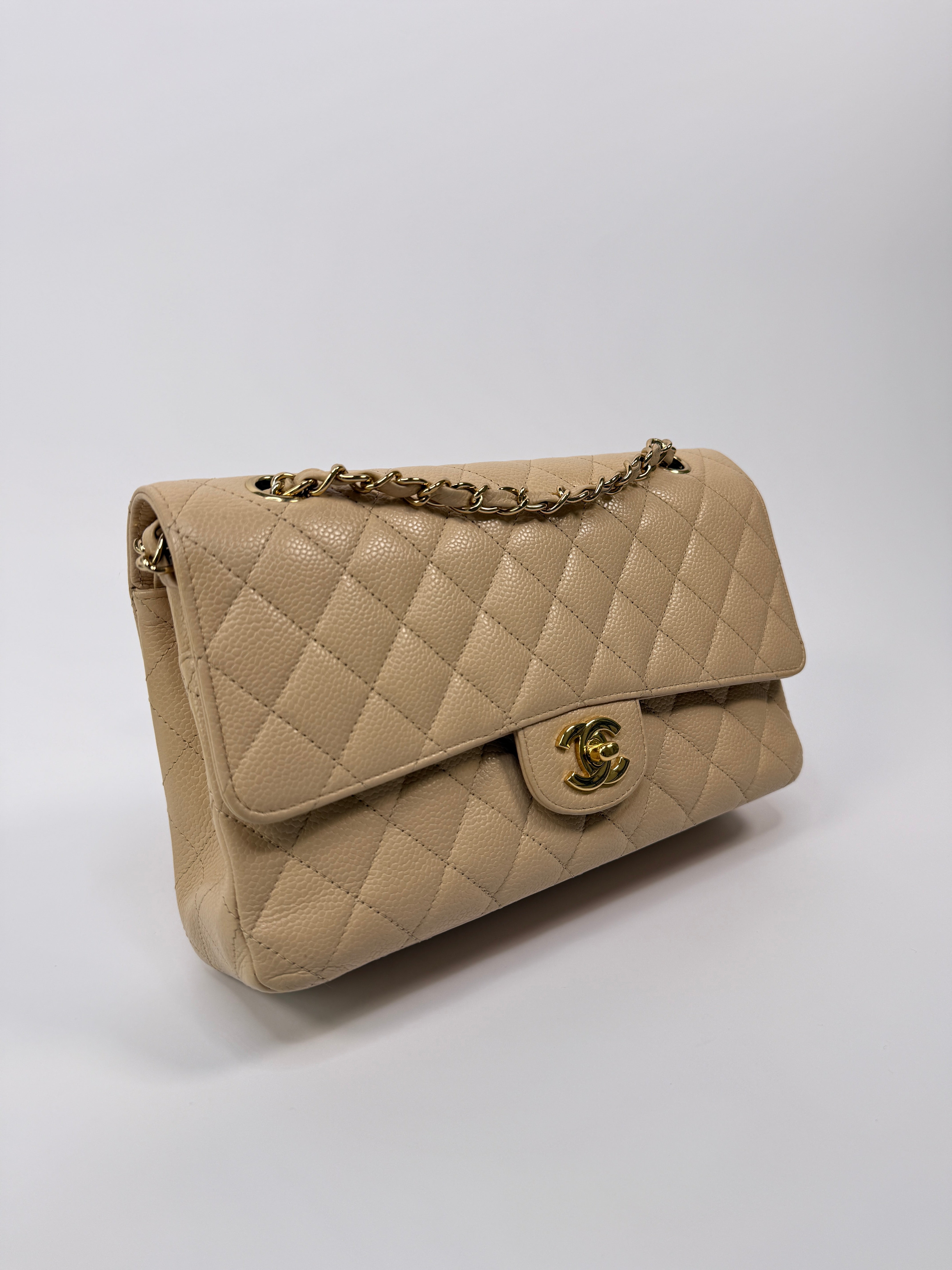 Chanel Medium Classic Double Flap Beige Caviar Leather With Gold Hardware
Pre Loved & Authentic