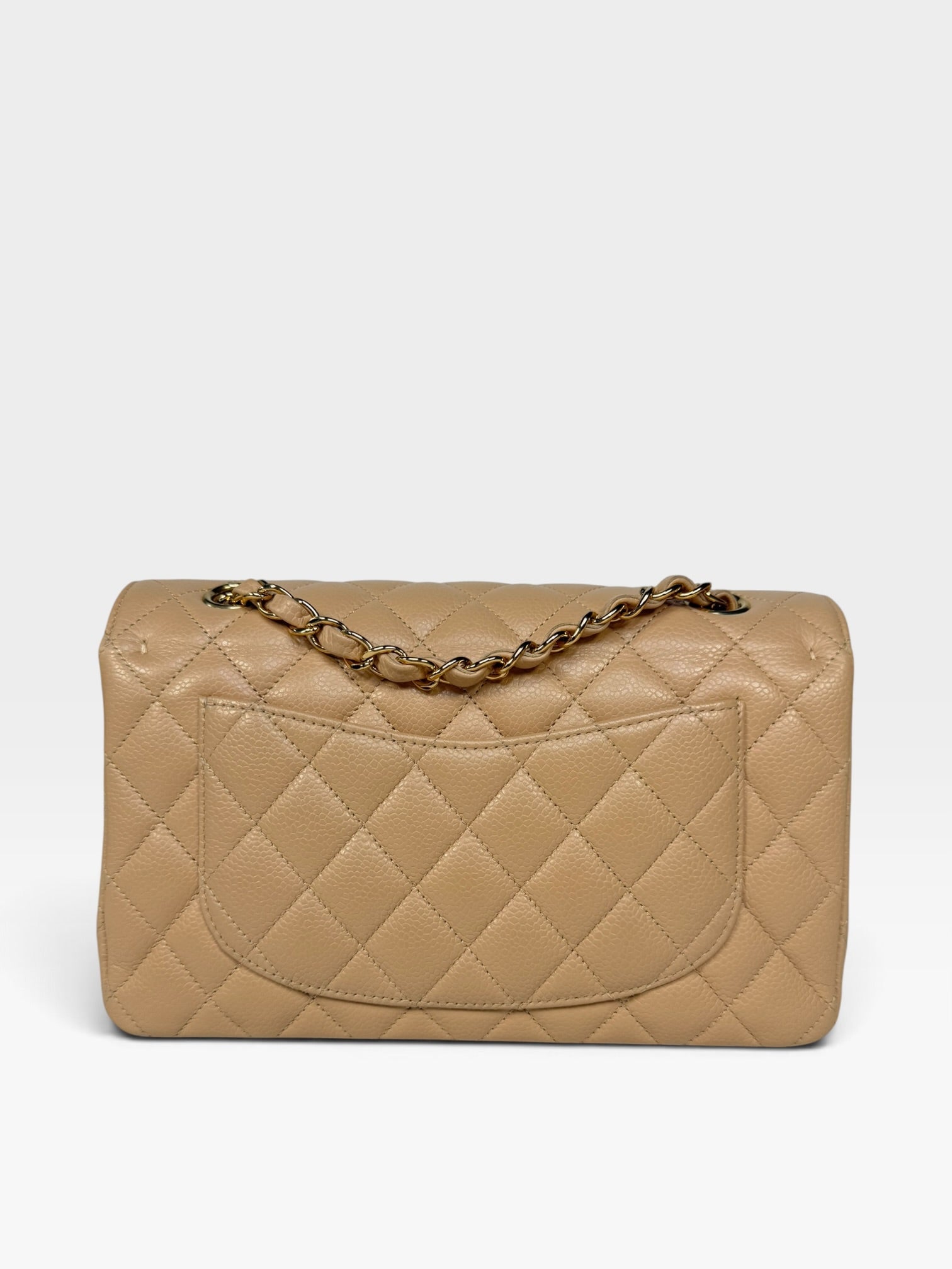 Chanel Small Classic Double Flap In Beige Caviar Leather With Gold Hardware. 100% authentic and preloved in excellent condition.