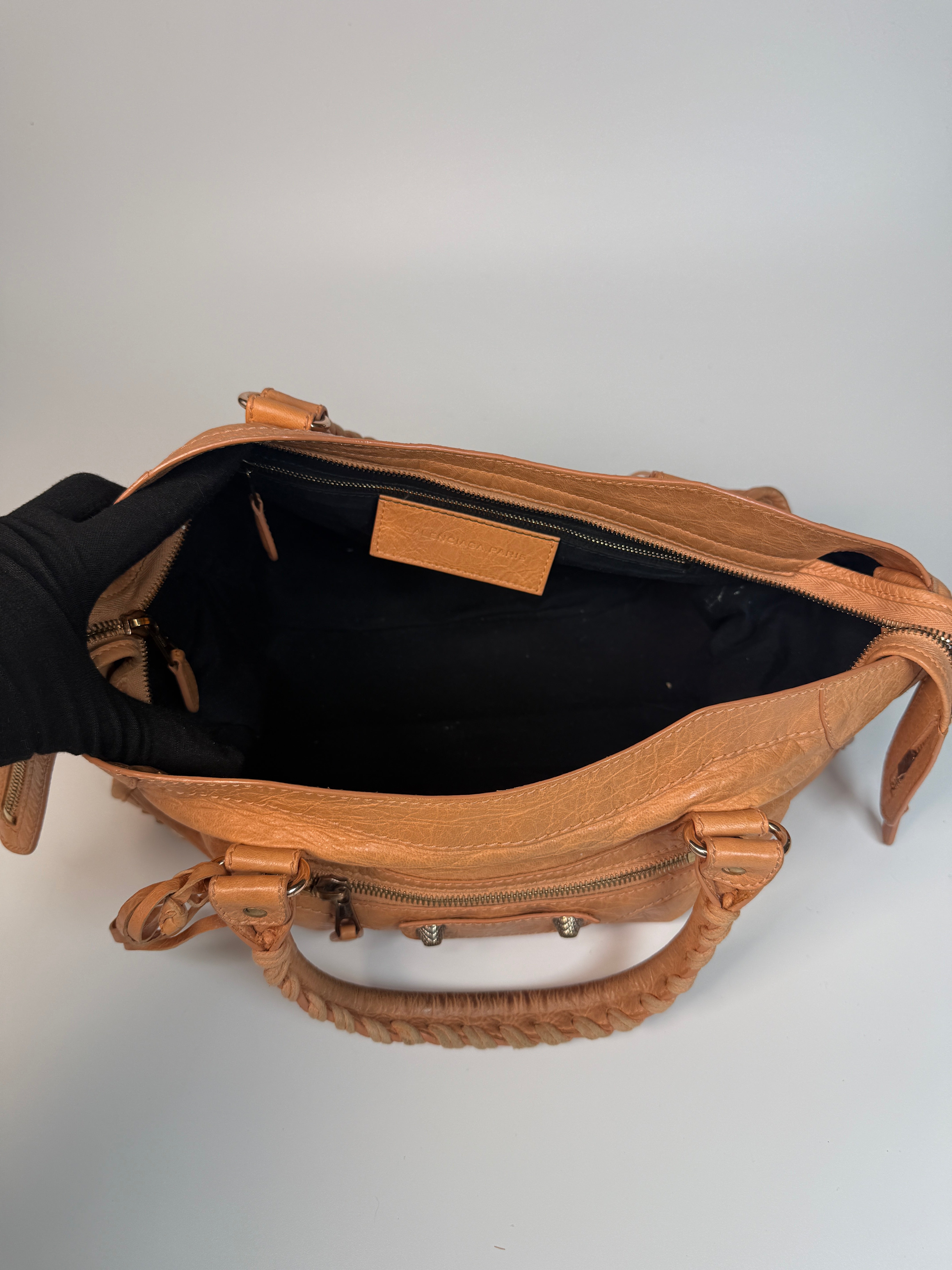 Authentic and preloved Balenciaga Medium Le City Bag In Peach Leather with silver hardware. Very good condition. 100% Authenticity guarantee.