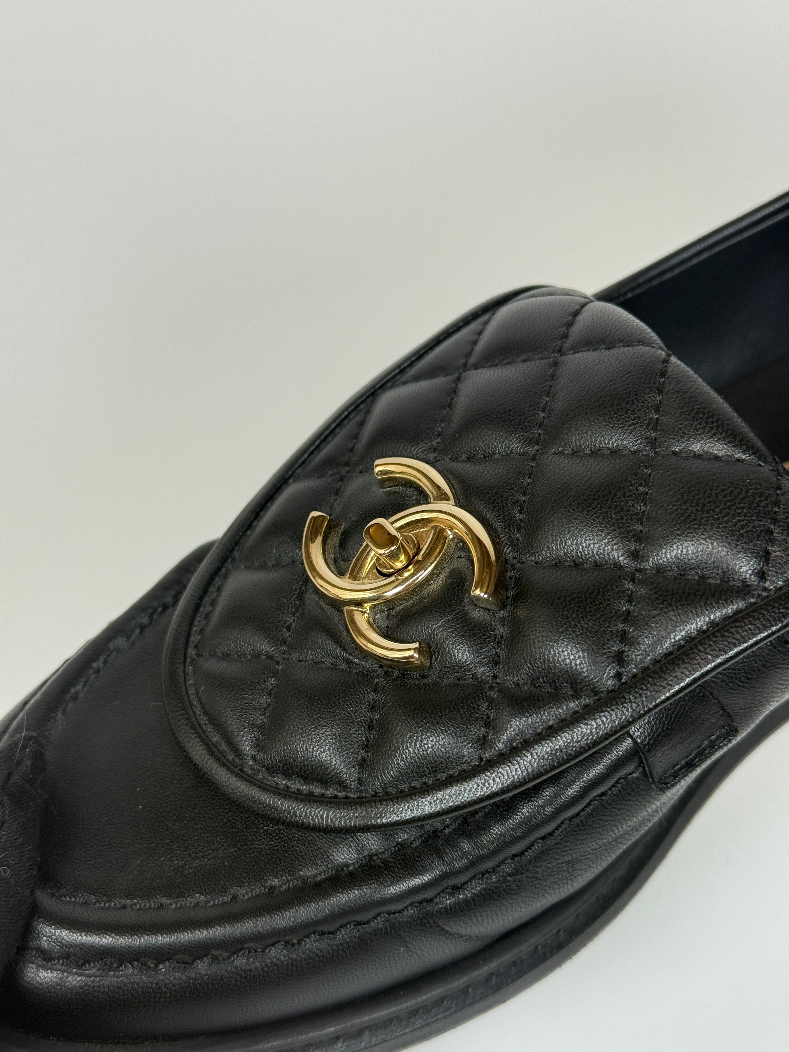 Authentic and preloved Chanel Black Quilted Leather Turnlock Loafers (Size 39/UK6) Excellent condition. 100% Authenticity guarantee
