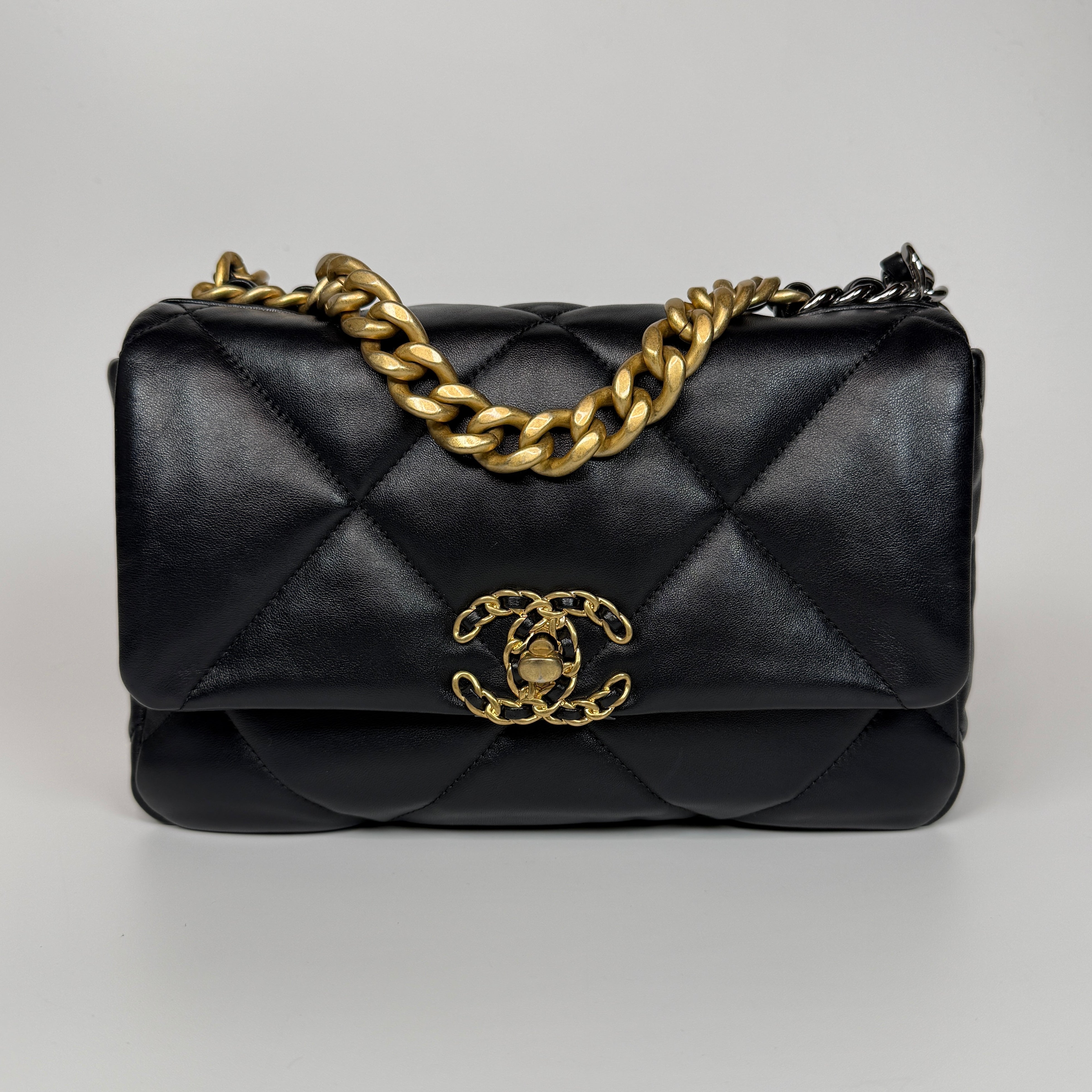 Authentic and preloved Chanel 19 Small In Black Lambskin Leather Mixed hardware. Excellent condition. 100% Authenticity guarantee