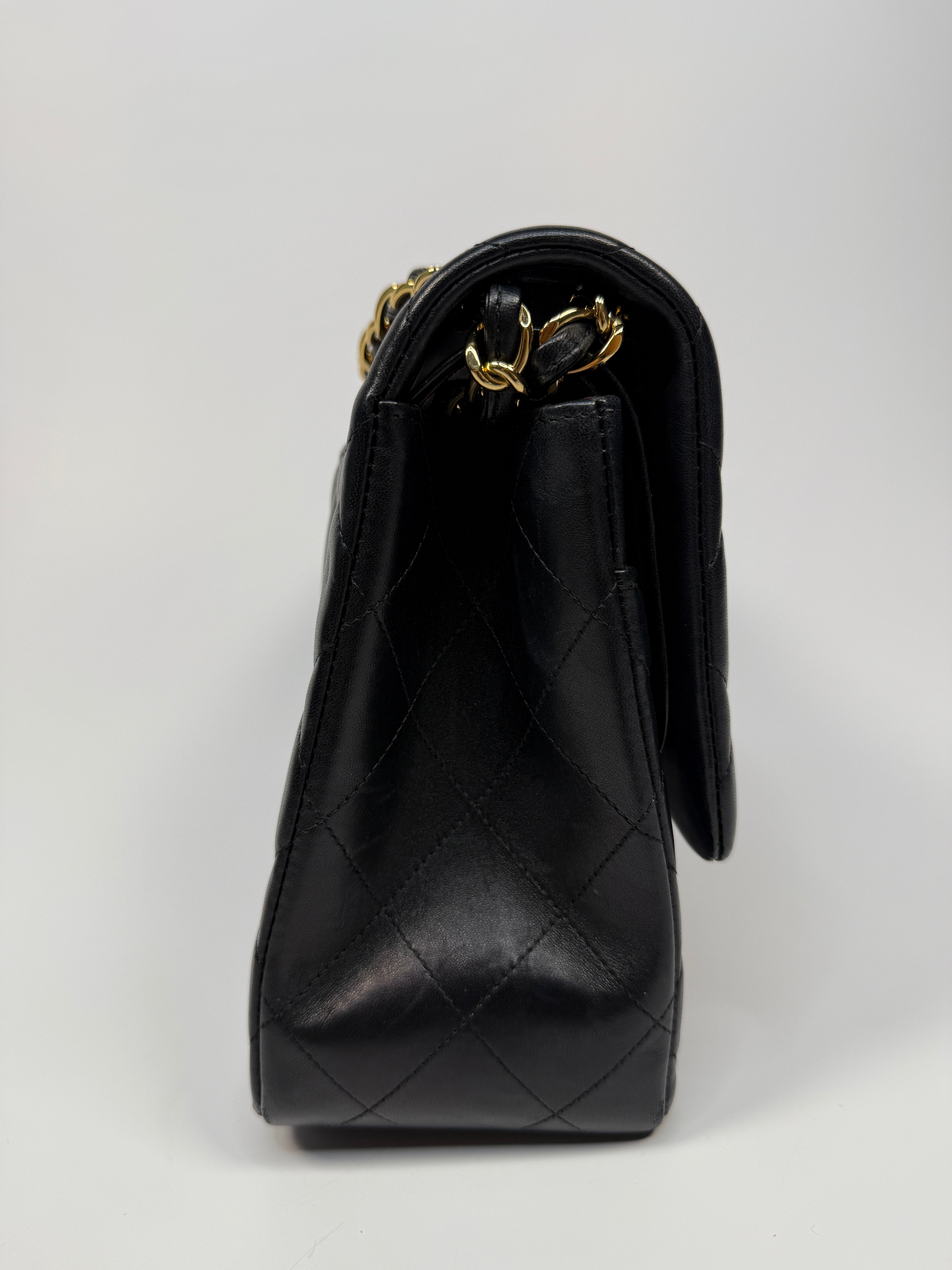 Chanel Jumbo Classic Flap Bag In Black Lambskin Leather With Gold Hardware
Pre Loved & Authentic