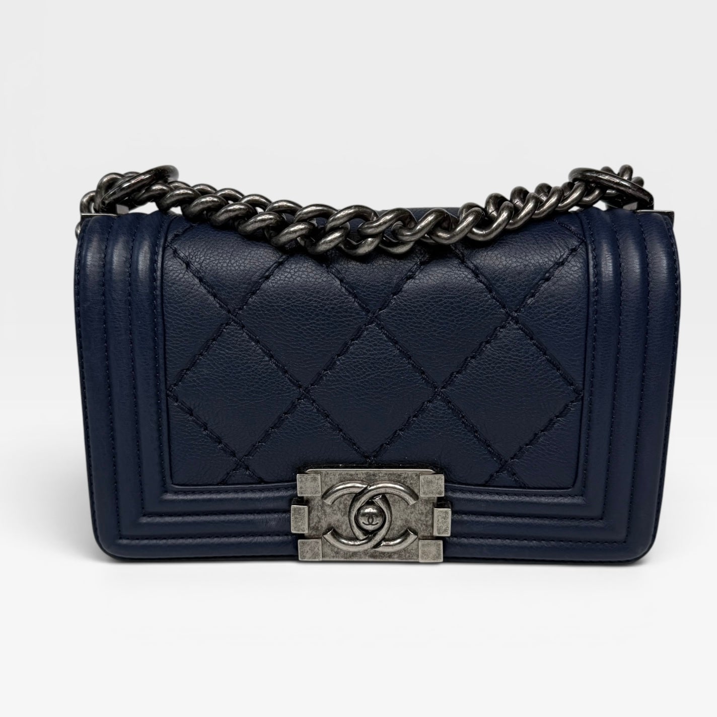 Chanel Mini Boy Bag In Navy Lambskin With Ruthenium Hardware In Excellent Condition.
Authentic Pre Loved Verified by Luxe Cheshire Trusted Designer resale