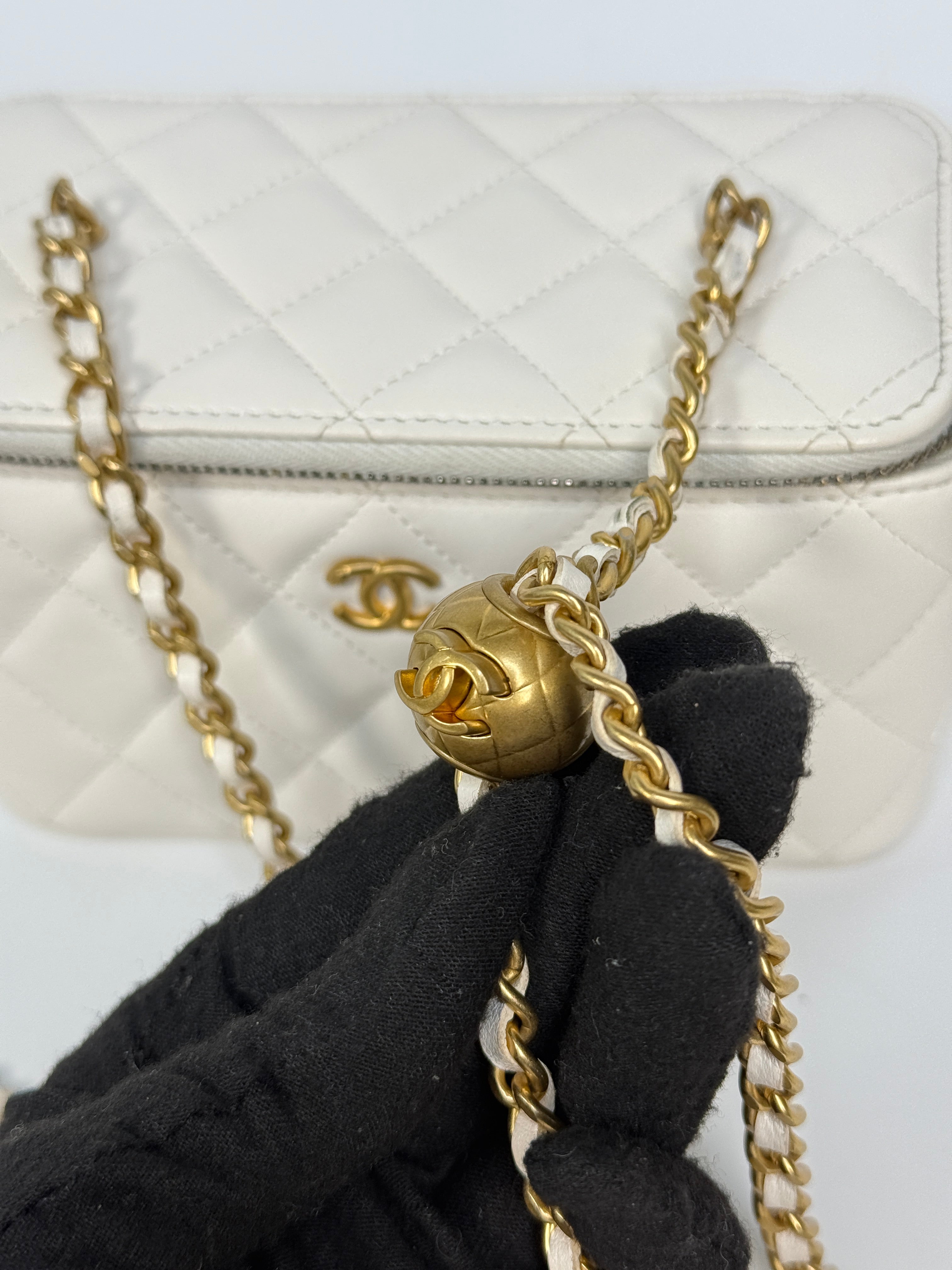 Authentic and preloved Chanel Quilted Pearl Crush Mini Vanity In White Lambskin Leather With Aged Gold Hardware
