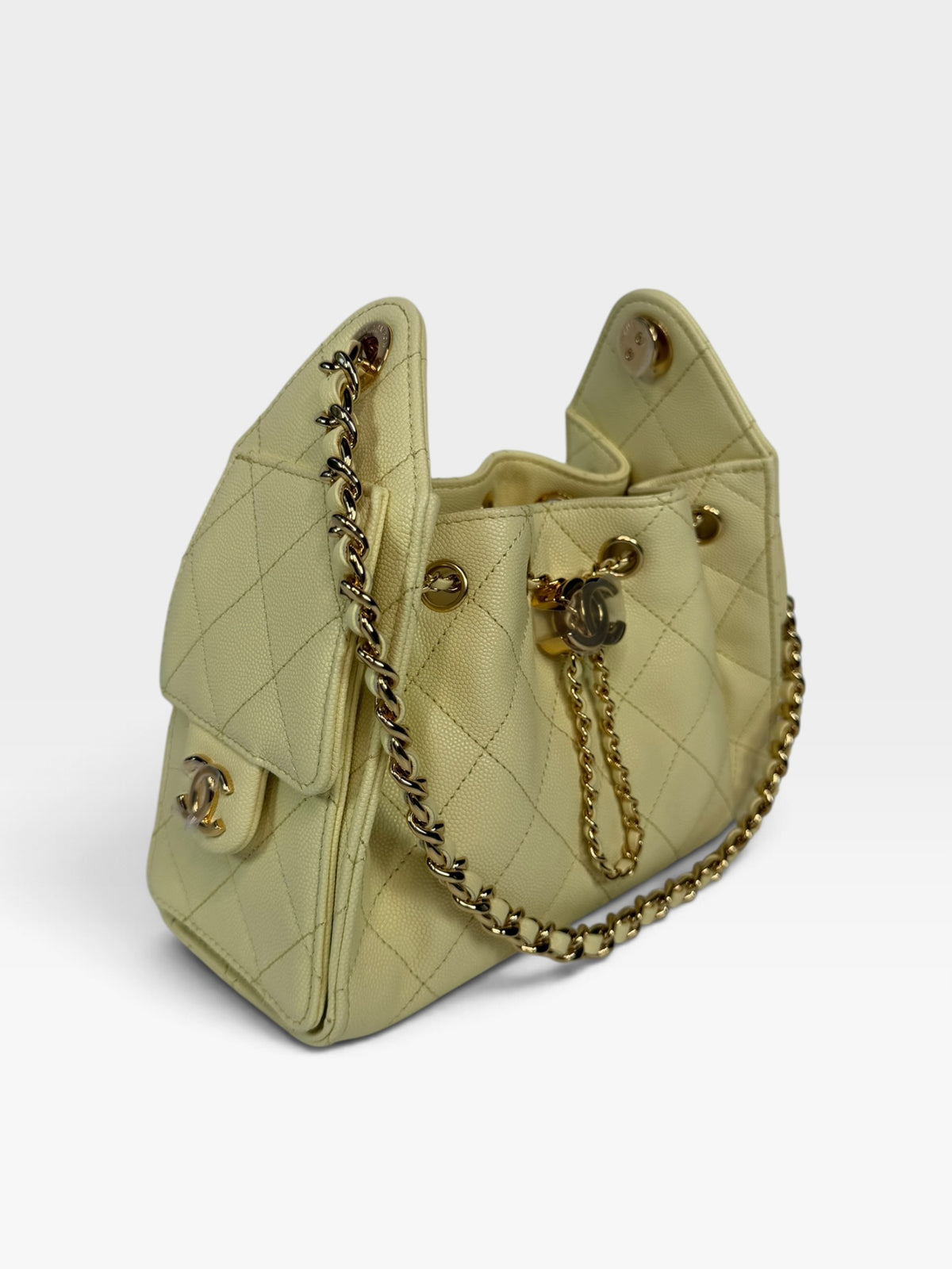 Chanel 25 Micro In Yellow Caviar Leather with Gold Hardware. 100% authentic and preloved in new and unused condition