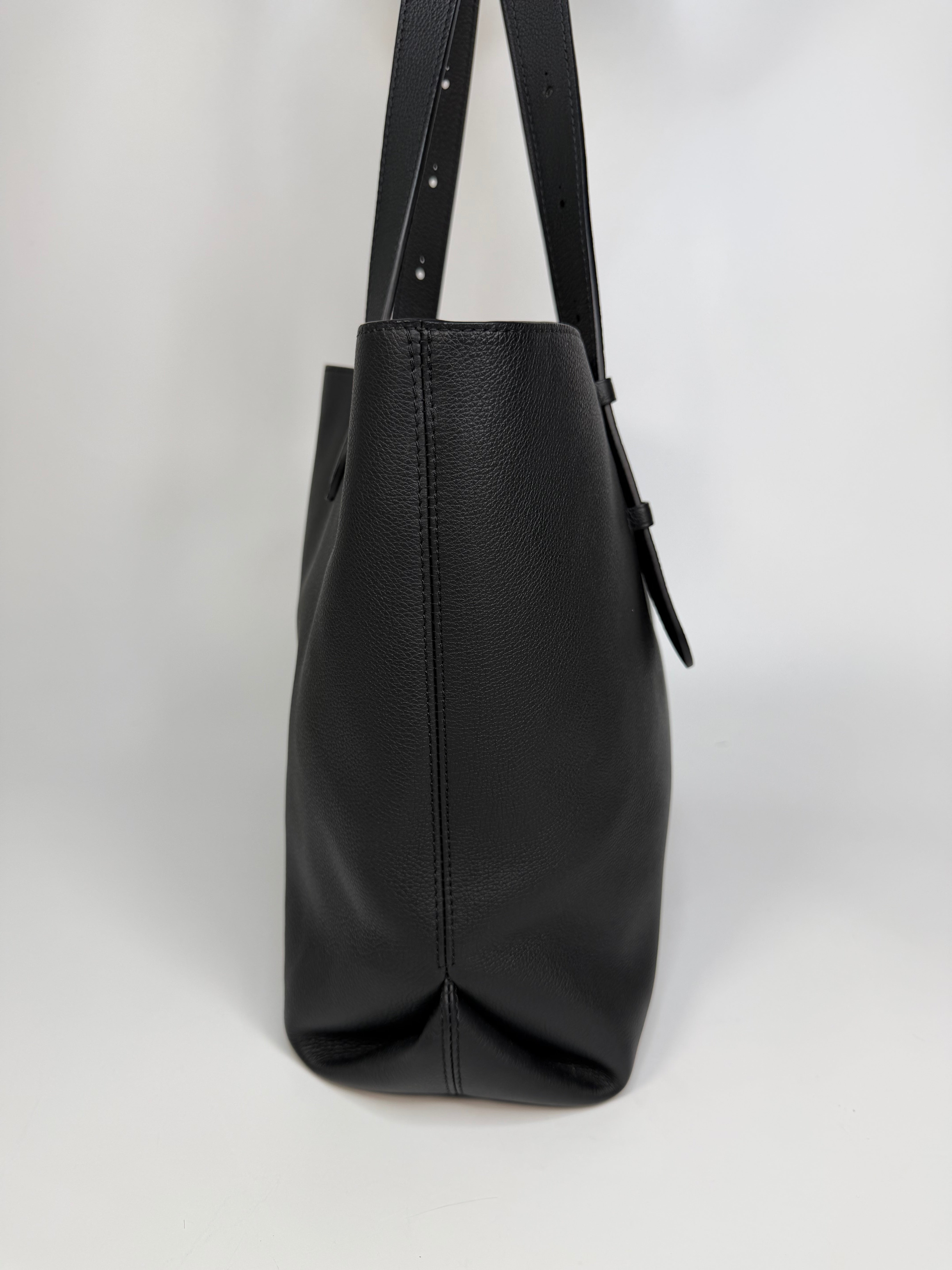 Louis Vuitton Low Key Cabas MM In Black Calfskin With Gold Hardware. Authentic and preloved in excellent condition