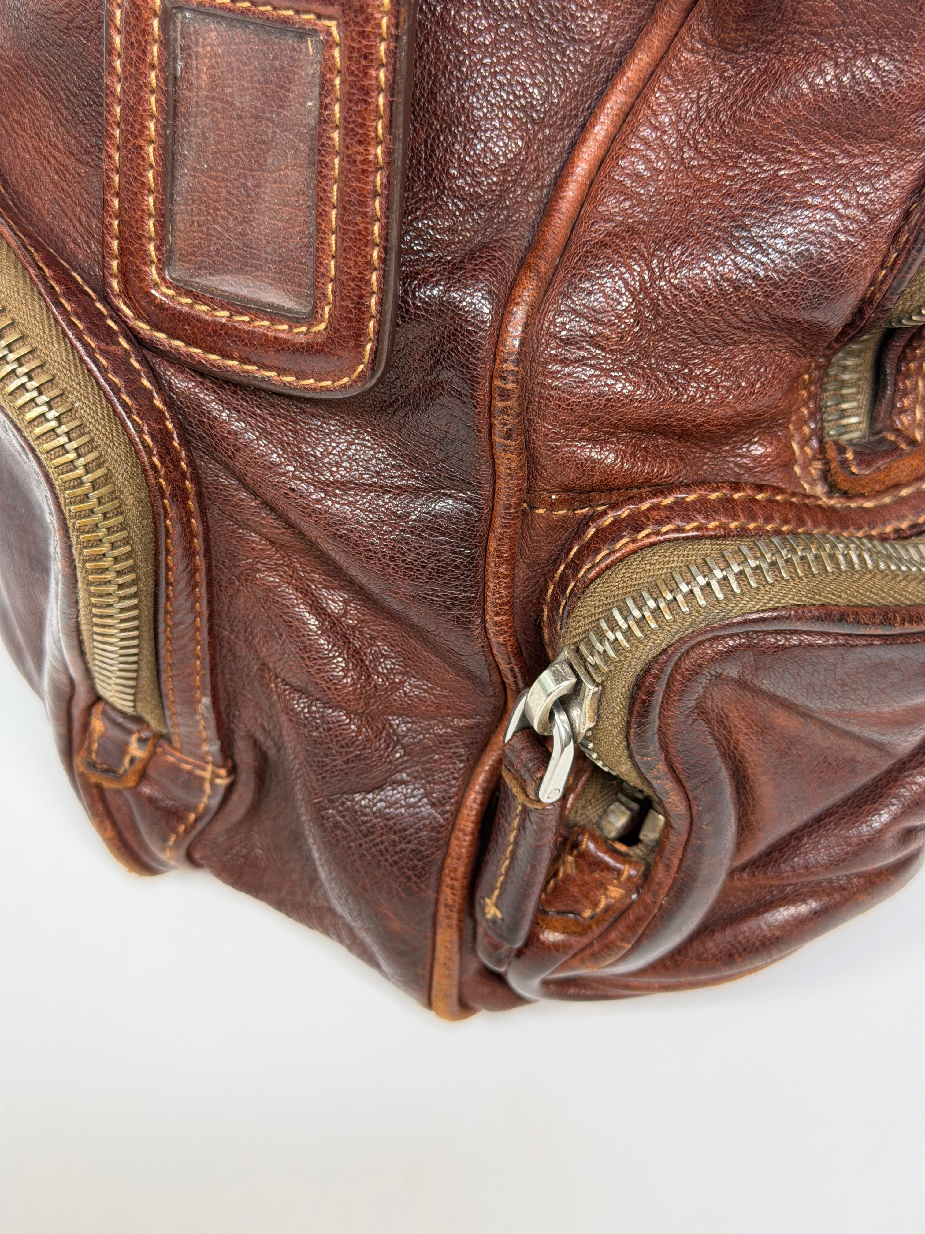 Prada Washed Bauletto Shoulder Bag In Brown Leather With Gold Hardware. Authentic and preloved in very good condition