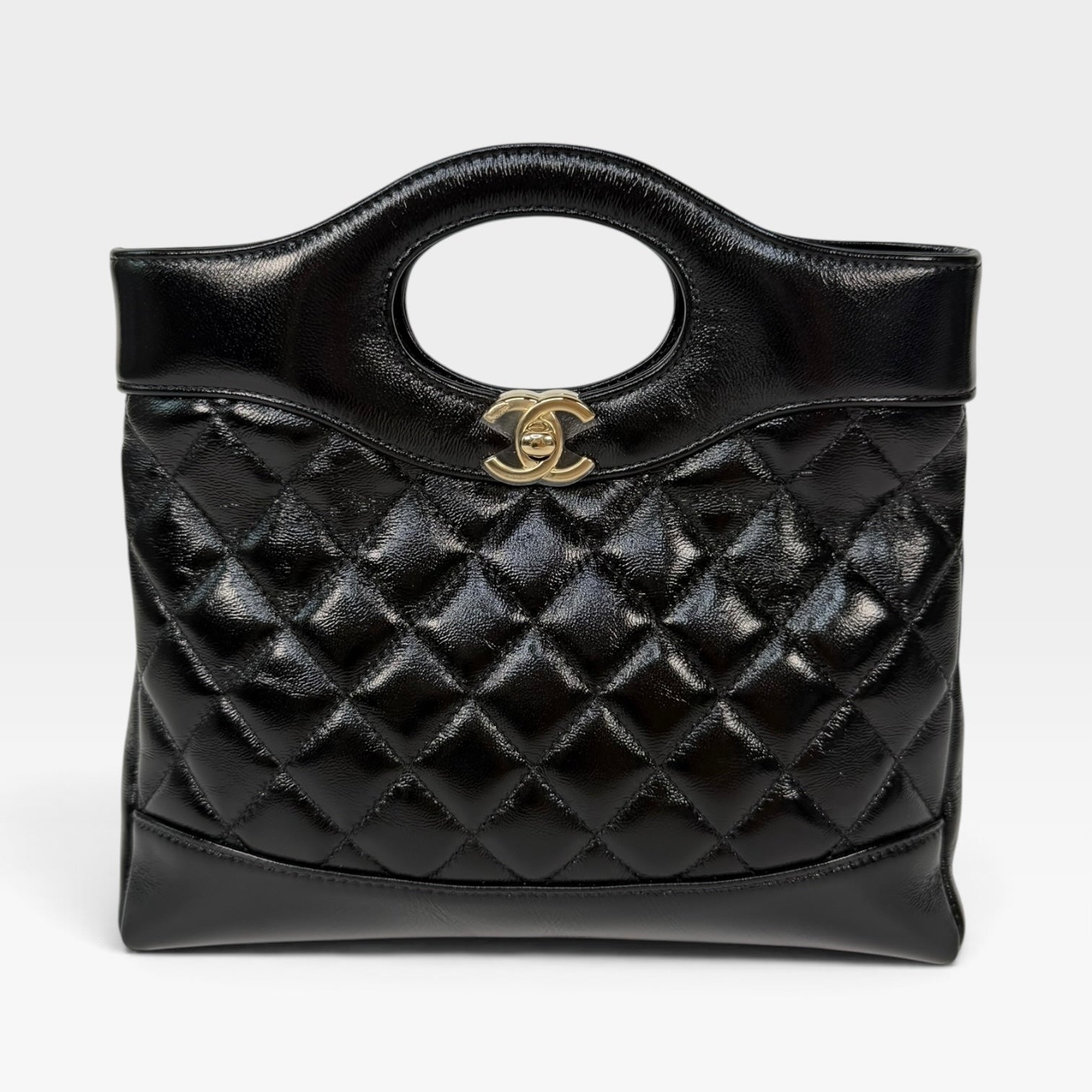 Chanel 31 Small In Black Calfskin Leather With Pale Gold Hardware
Excellent Condition, verified by Luxe Cheshire. Authentic and preloved