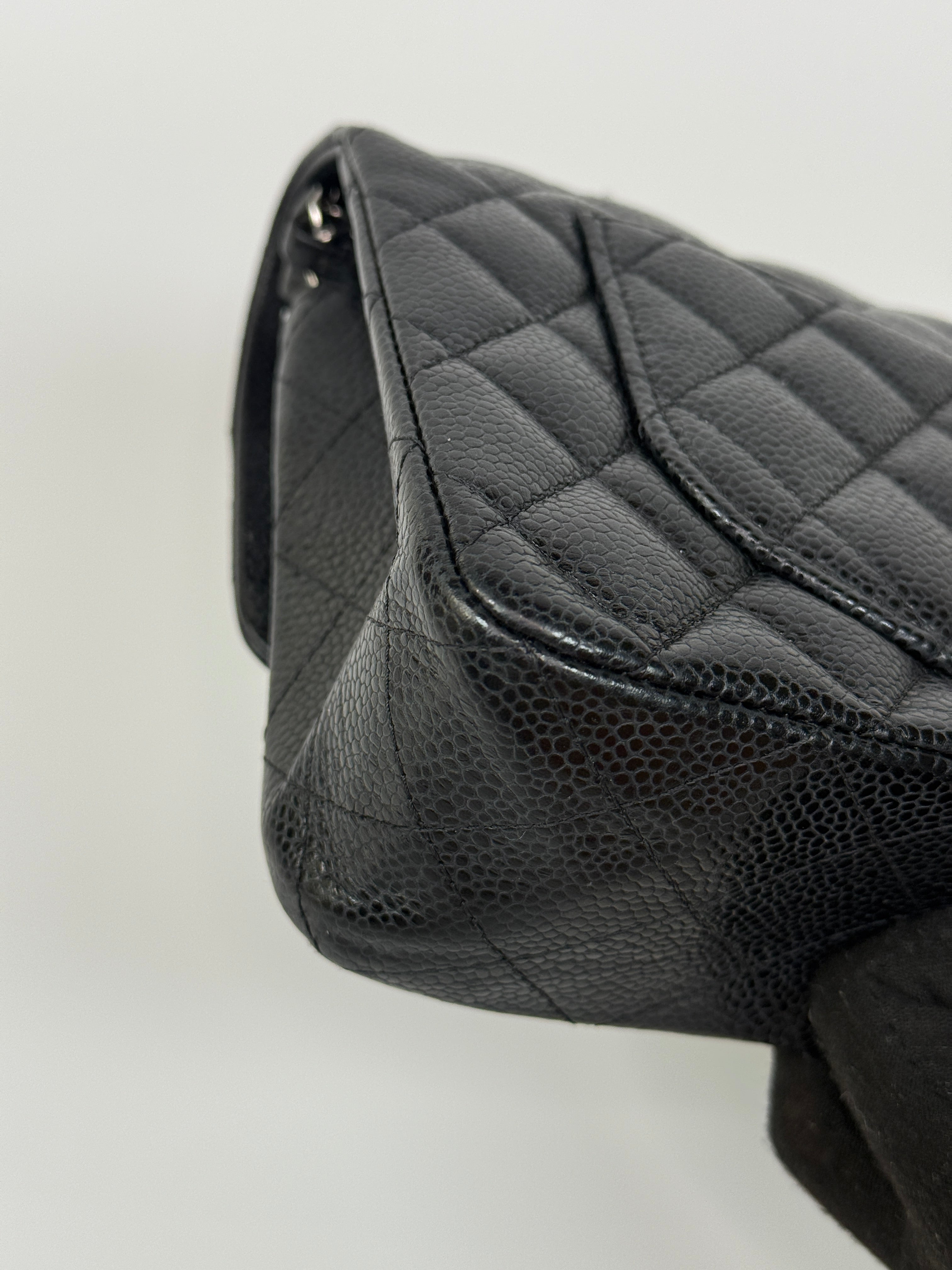 Chanel Small Classic Double Flap In Black Caviar Leather With Silver Hardware. Authentic and preloved in very good condition. 100% Authenticity guarantee