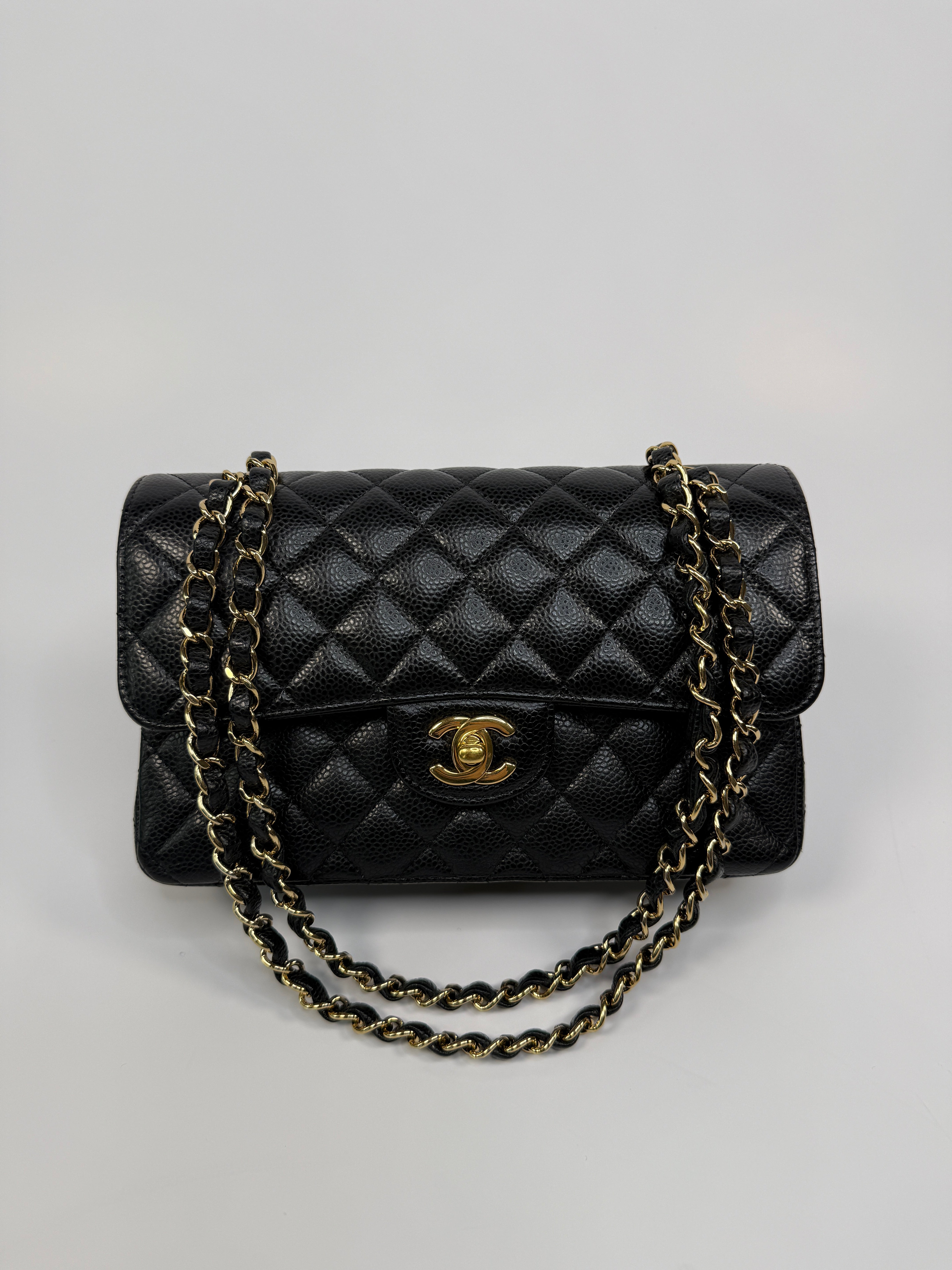 Chanel Small Classic Double Flap In Black Caviar Leather With Gold Hardware
Pre Loved & Authentic