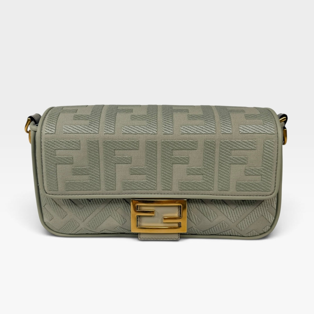 Fendi Baguette In Green Tea FF Monogram Fabric and Canvas With Gold Hardware. 100% authentic and preloved in excellent condition
