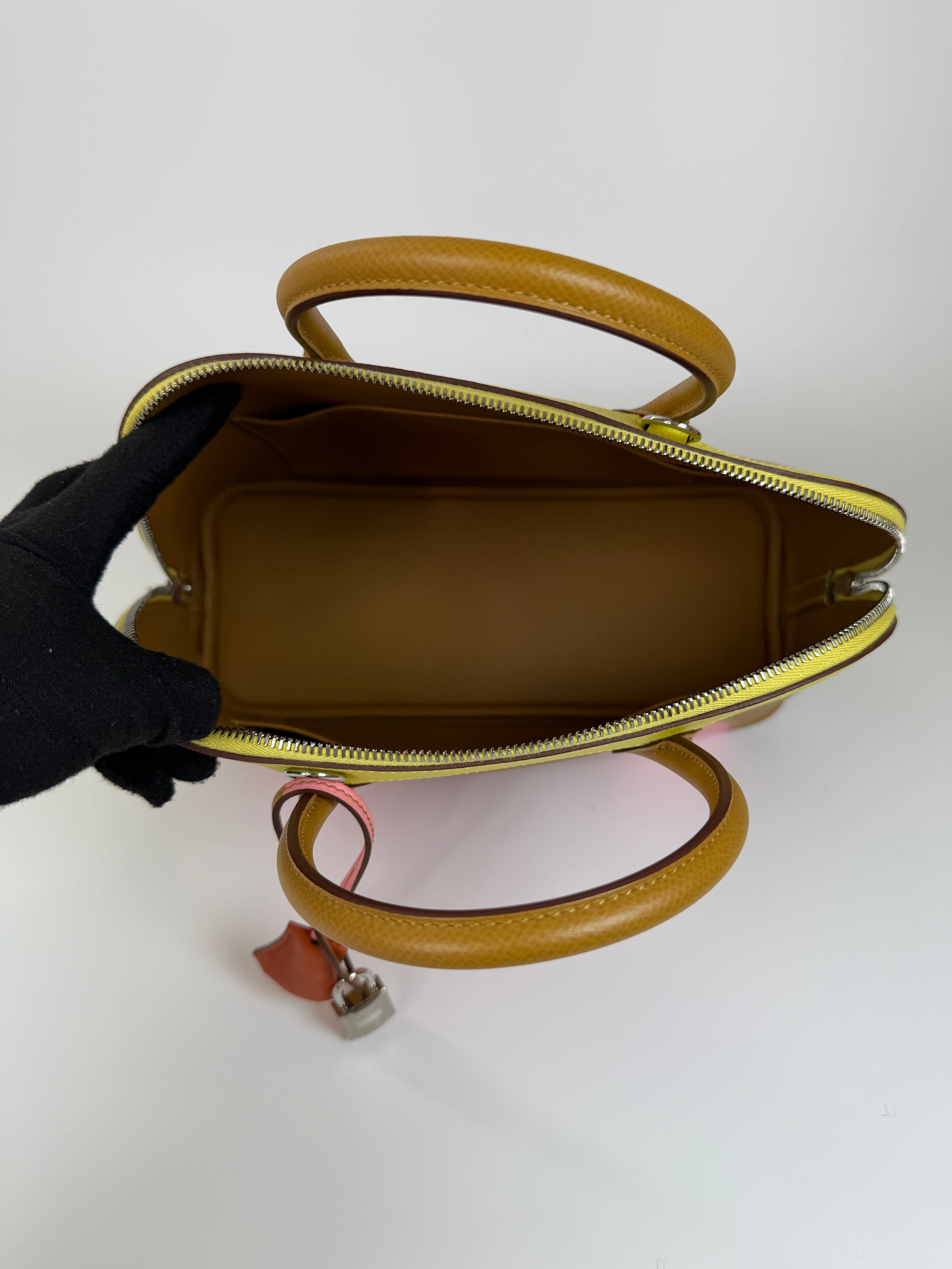 Authentic and preloved Hermès Bolide 30 Rainbow Sunrise Handbag With Palladium Hardware. 100% Authenticity Guarantee