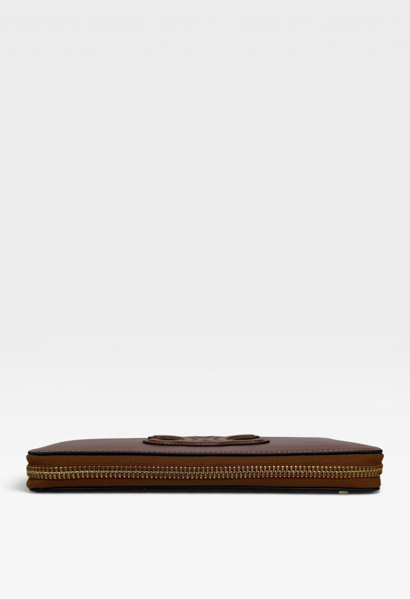 Celine Triomphe Long Wallet In Tan Calfskin With Gold Hardware. Authentic and preloved in excellent condition