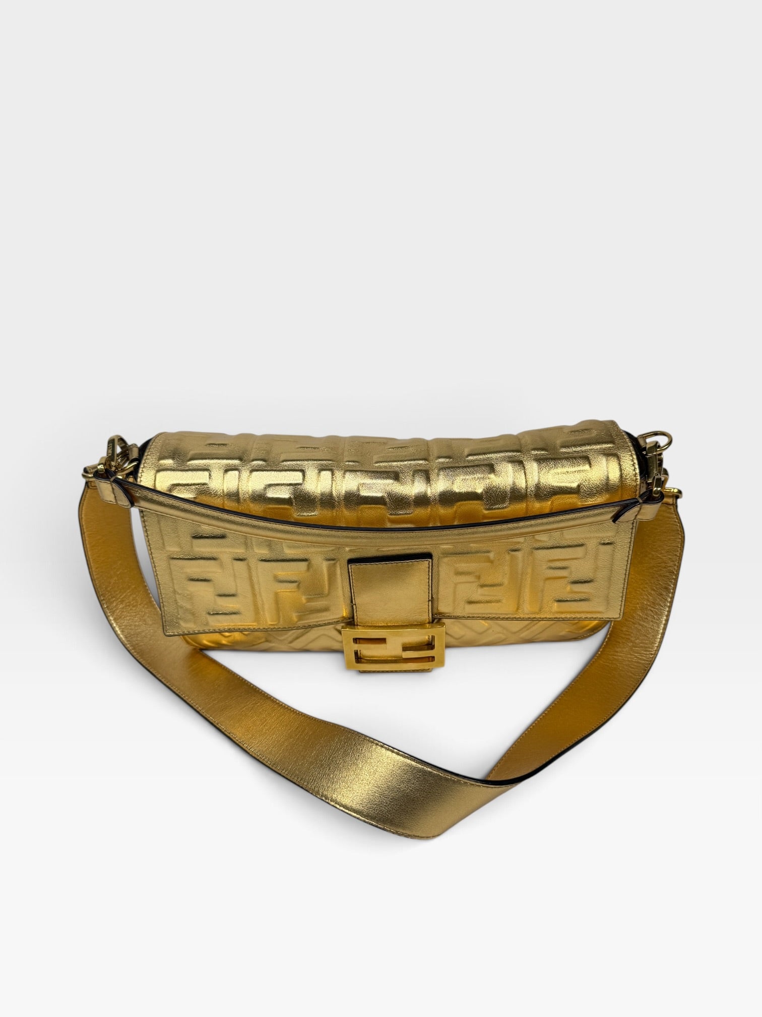 Fendi Large Baguette In Gold Leather Monogram With Gold Hardware. 100% authentic and preloved in excellent condition