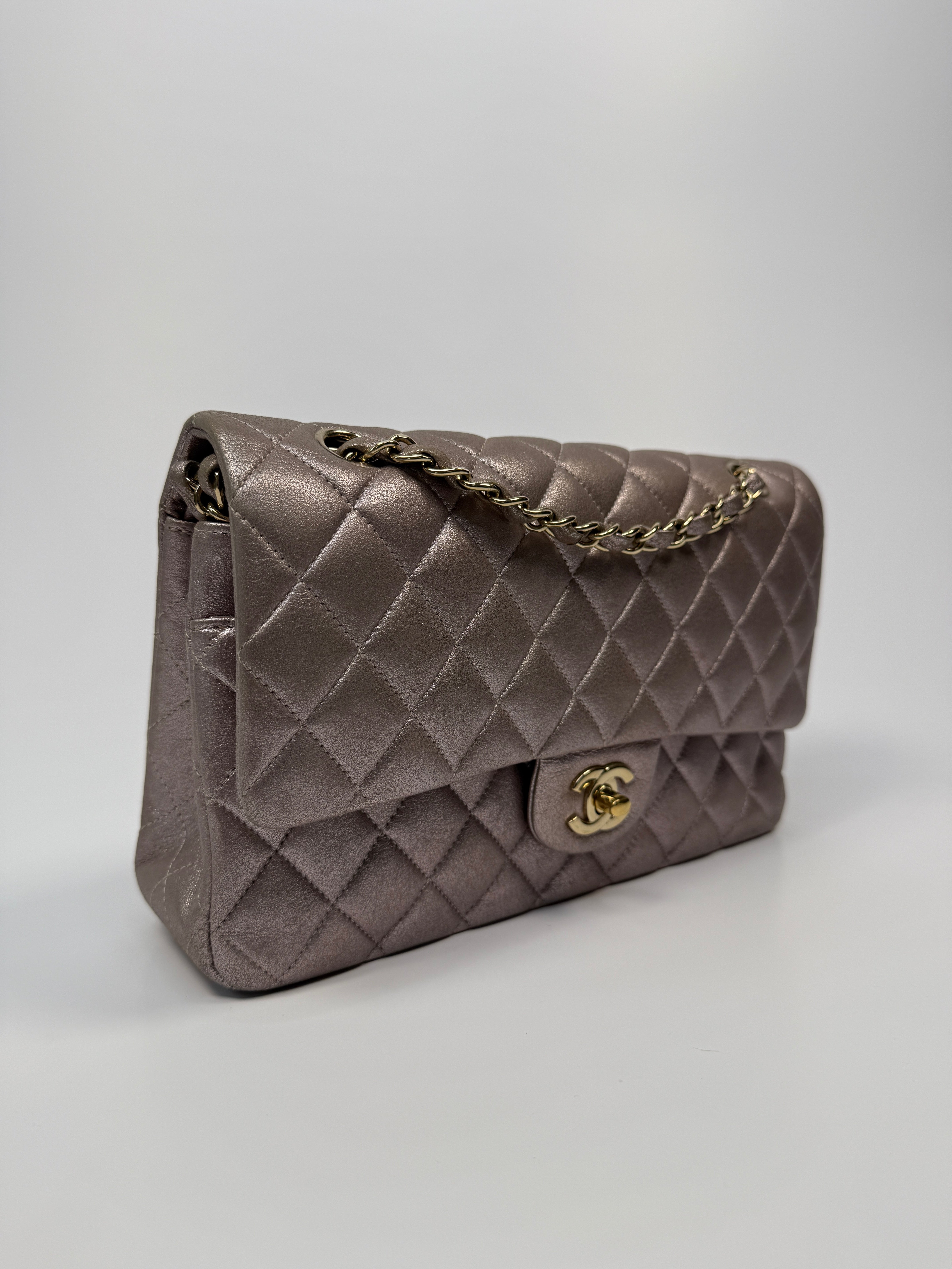 Authentic pre-loved Chanel Iridescent Rose Medium Classic Double Flap With Gold Hardware.