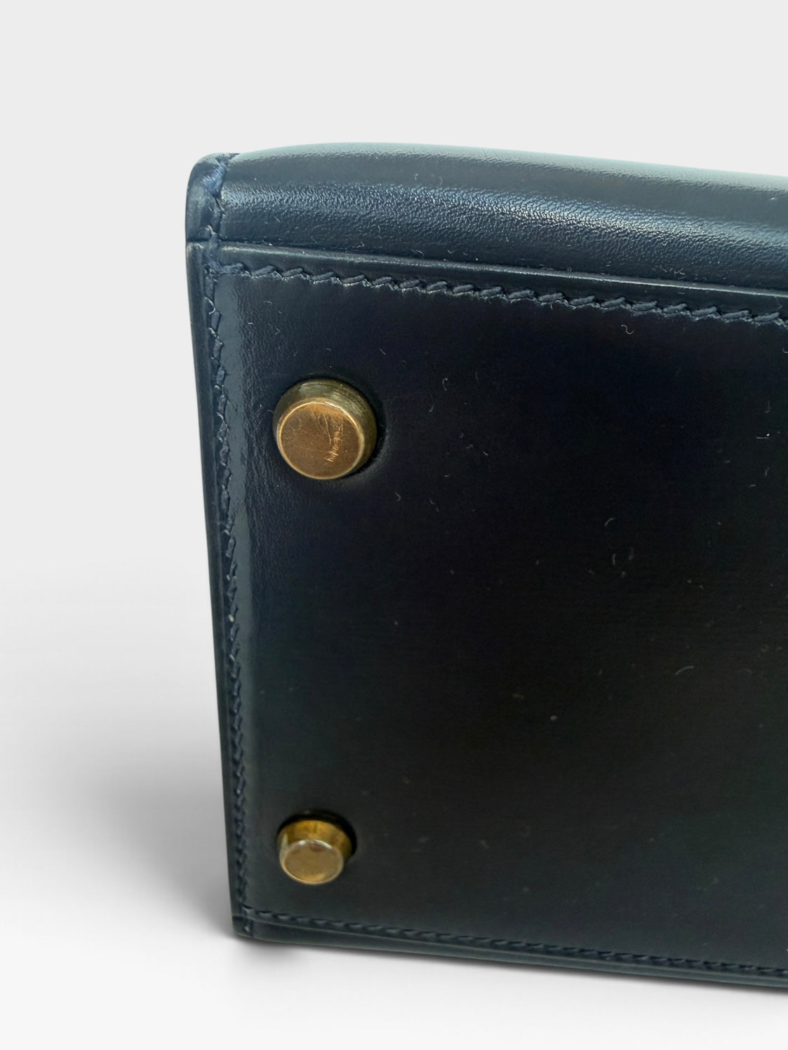 Hermès Vintage Kelly 28 In Navy Sellier Box Leather With Gold Hardware. 100% authentic and preloved in excellent condition.