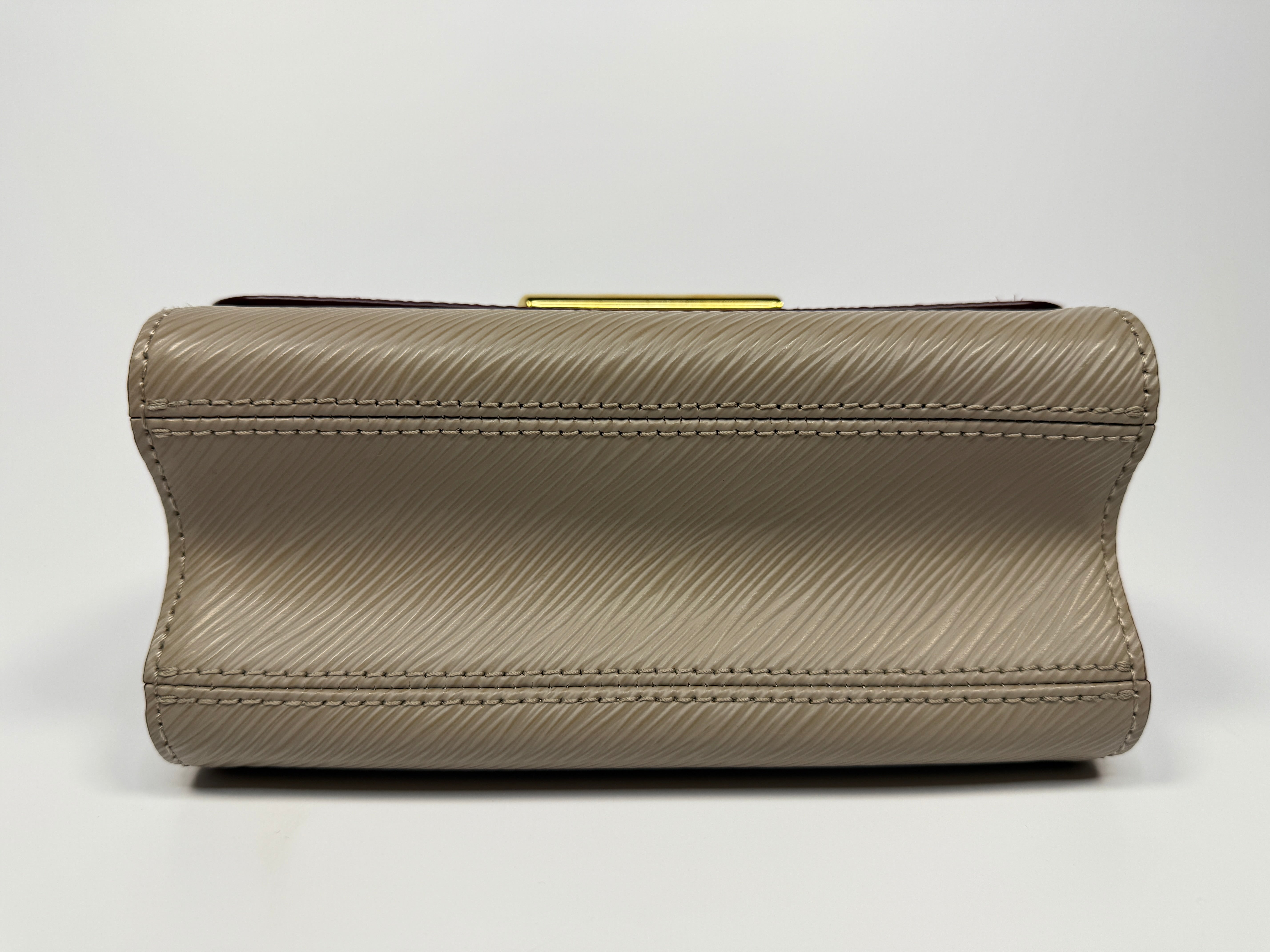 Louis Vuitton Twist PM Shoulder Bag In Beige leather with gold hardware. Authentic and pre loved excellent condition