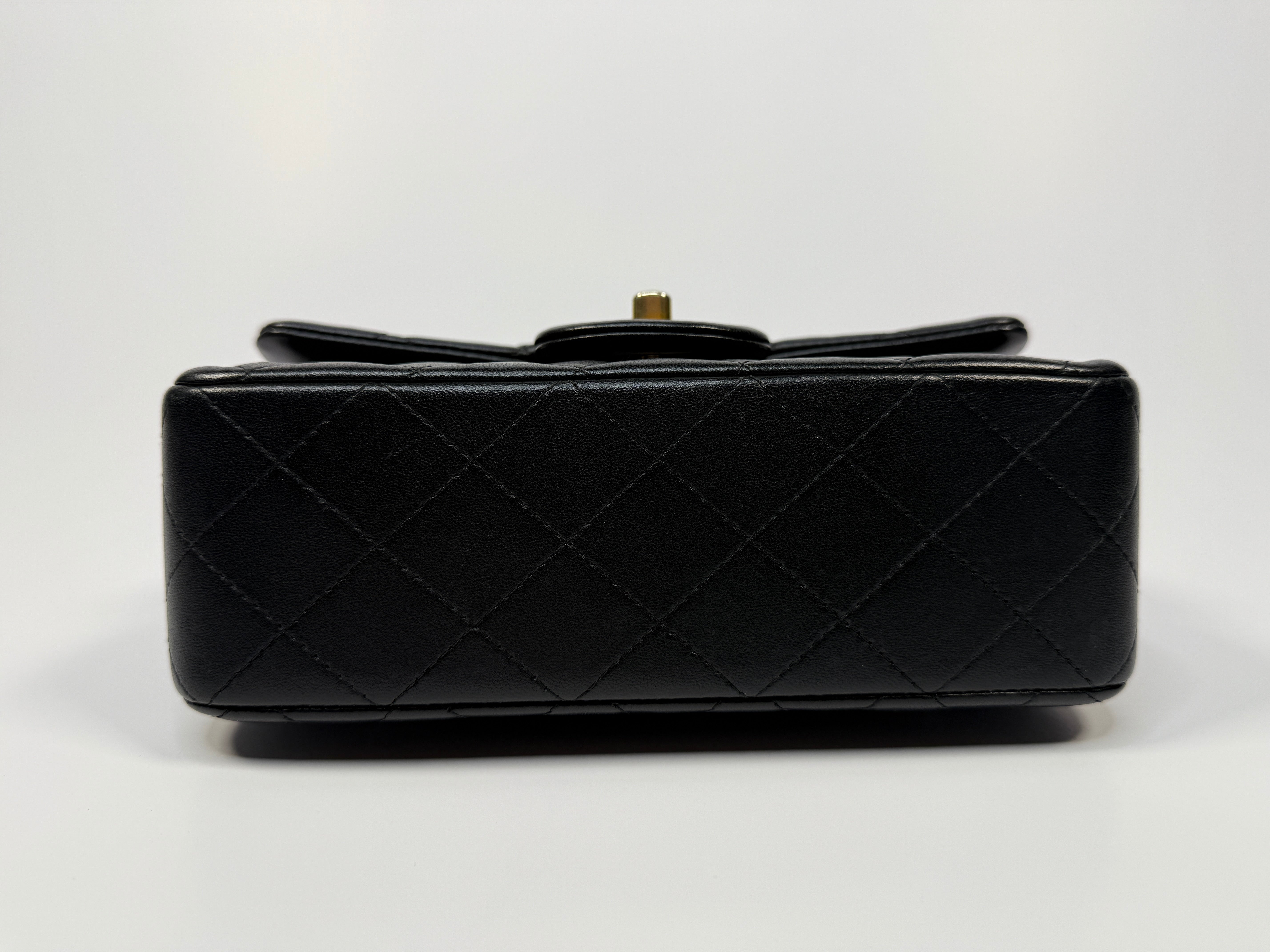 Chanel Mini Rectangle Top Handle Flap Bag In Black Lambskin With Gold Hardware
Pre Loved & Authentic