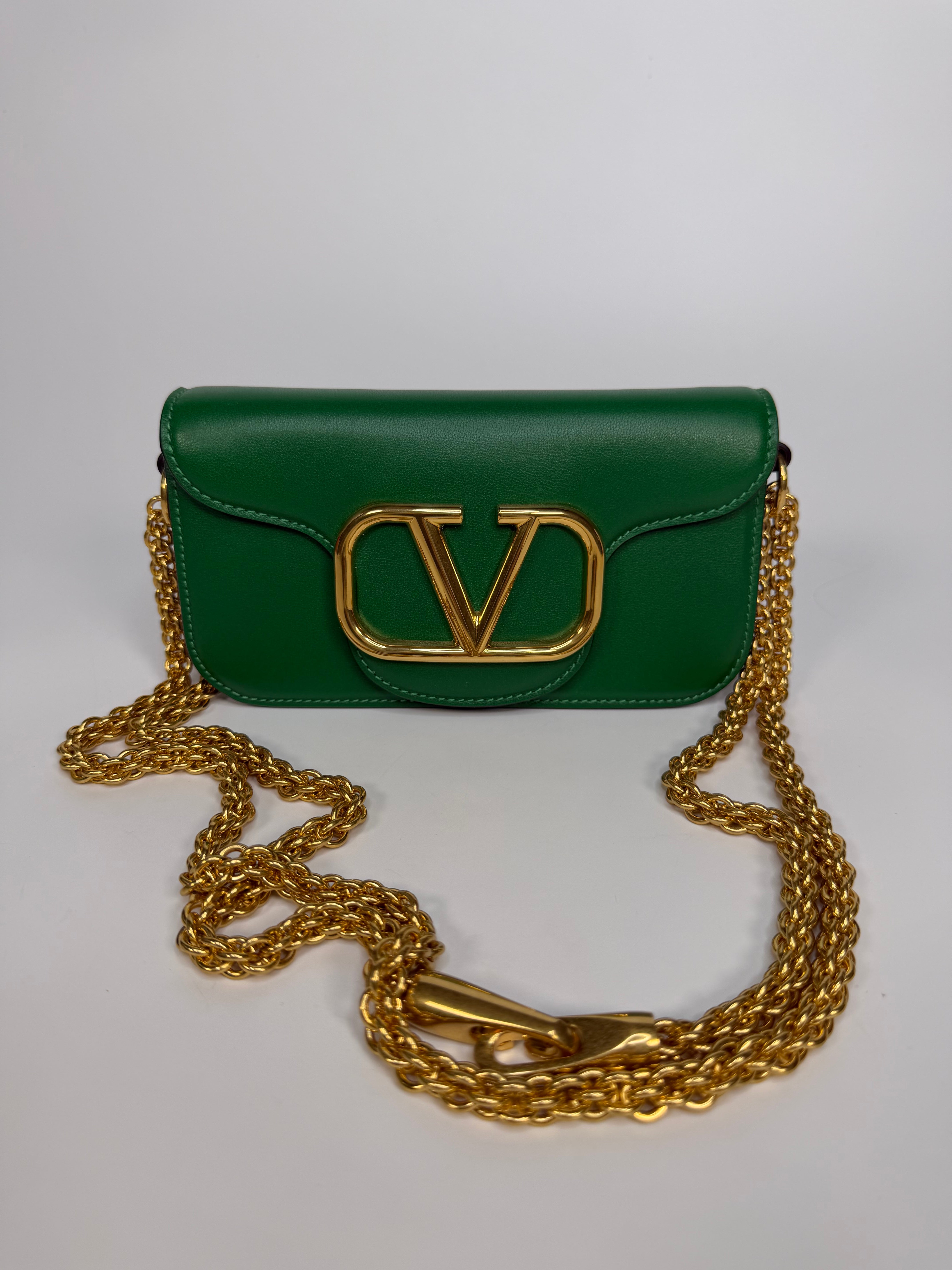 Valentino Garavani Locò Small Shoulder Bag In Green Leather With Gold Hardware. Authentic and preloved in excellent condition