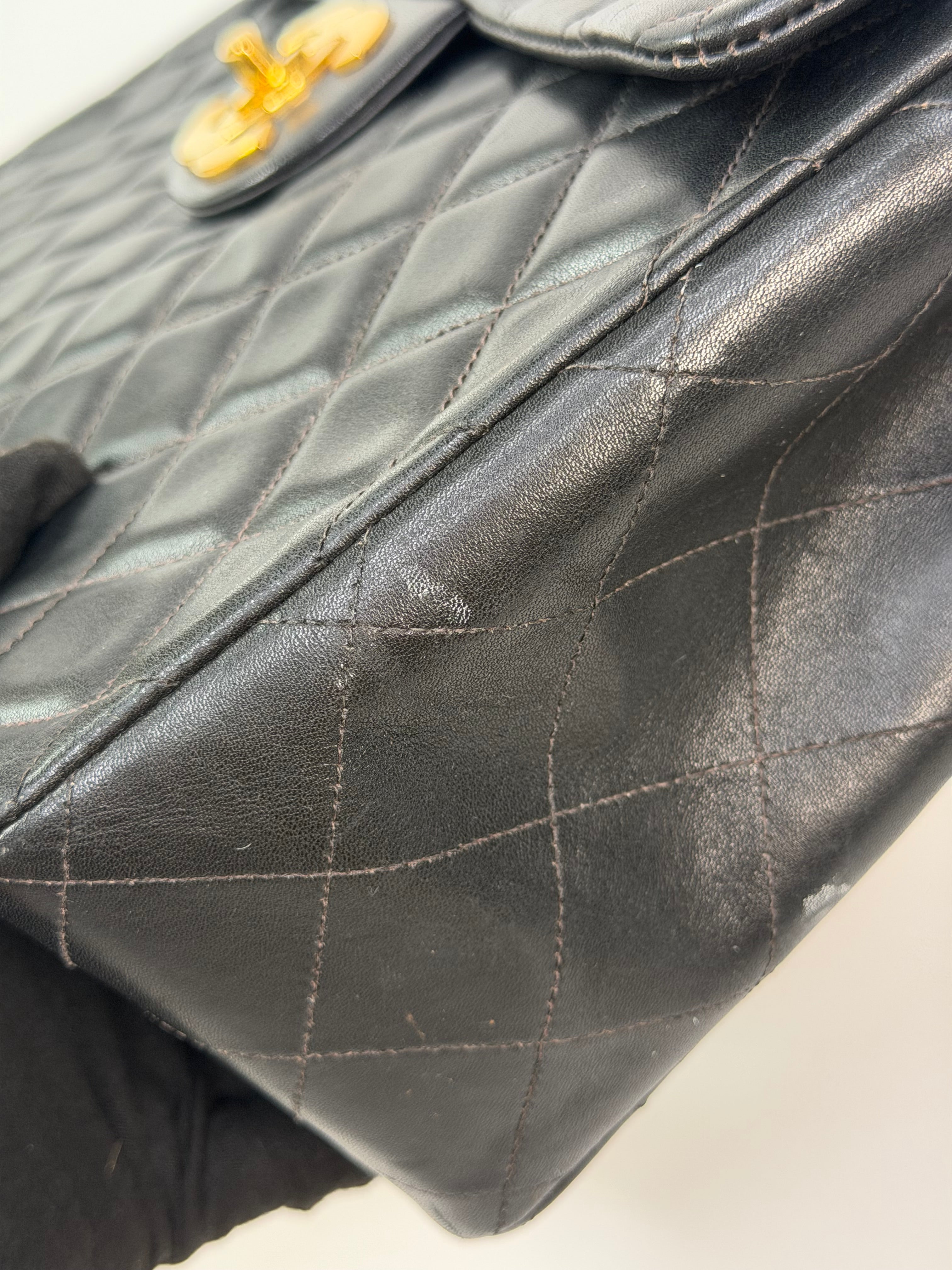 Chanel Vintage XL Maxi Flap Bag In Black Lambskin Gold Hardware. 100% authentic and preloved in excellent condition