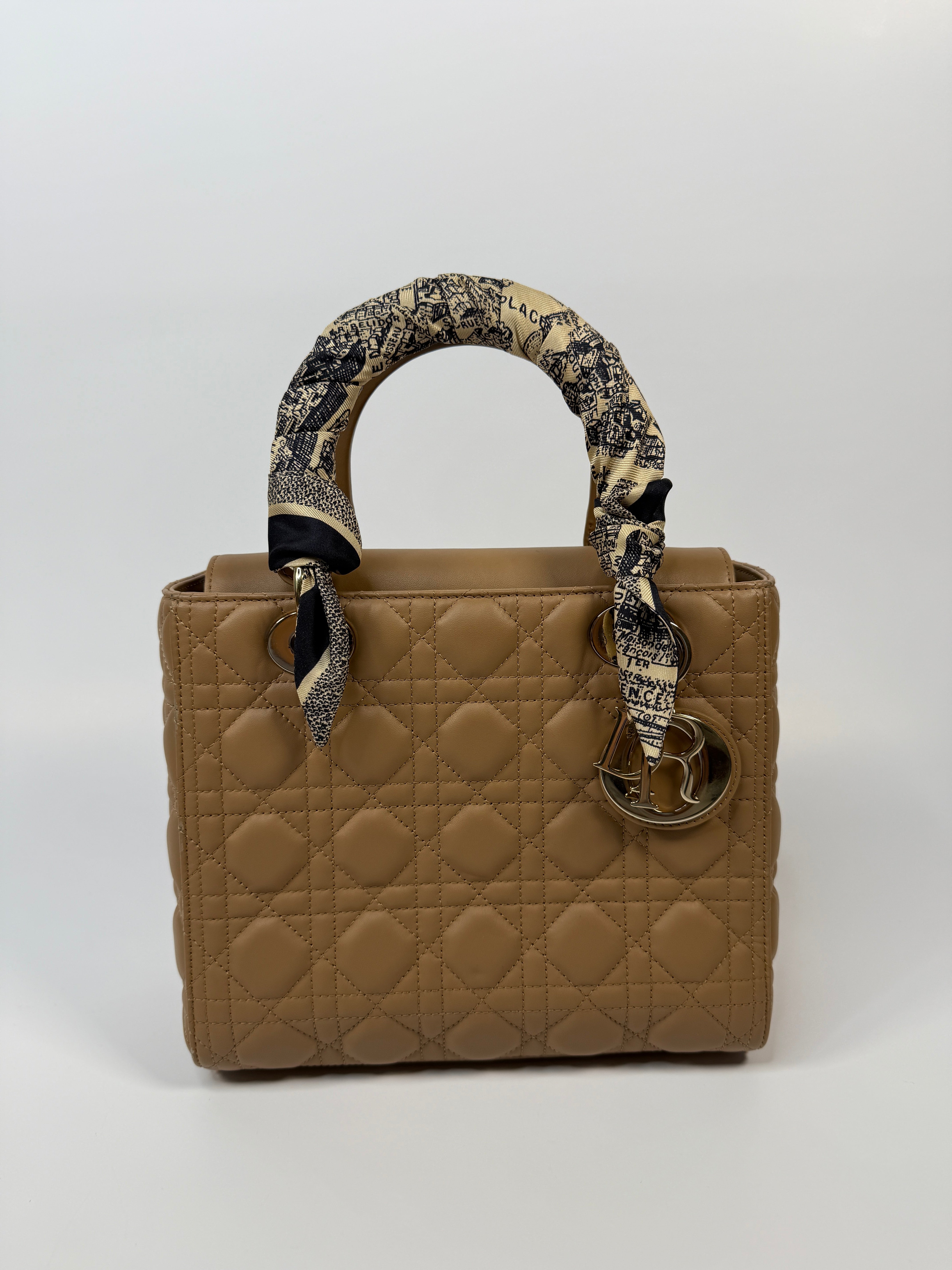 Authentic pre-loved Christian Dior Medium Lady Dior Bag in gold with gold hardware