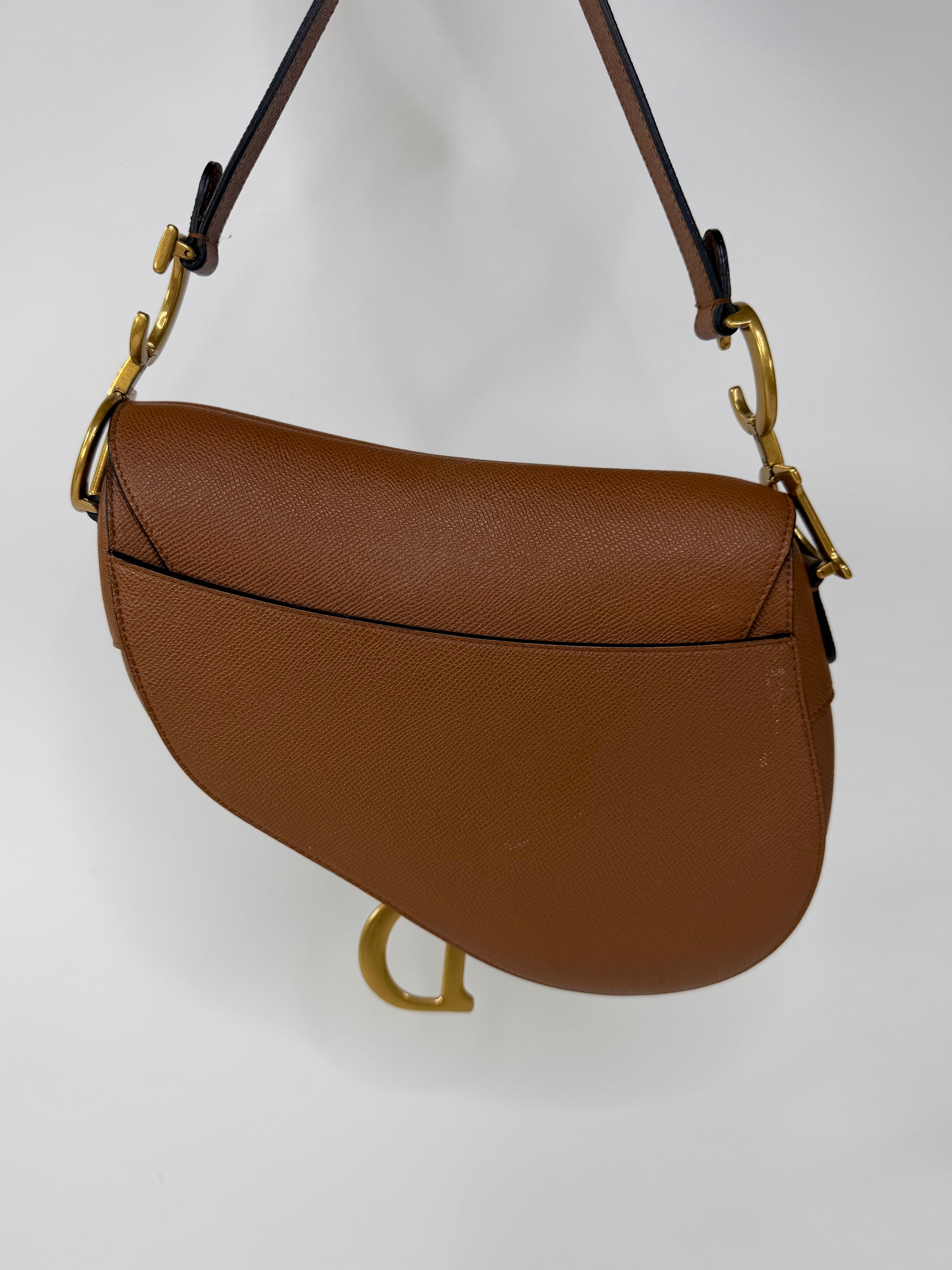 Christian Dior Saddle Bag In Golden Calfskin Gold Hardware. 100% authentic and preloved in excellent condition.