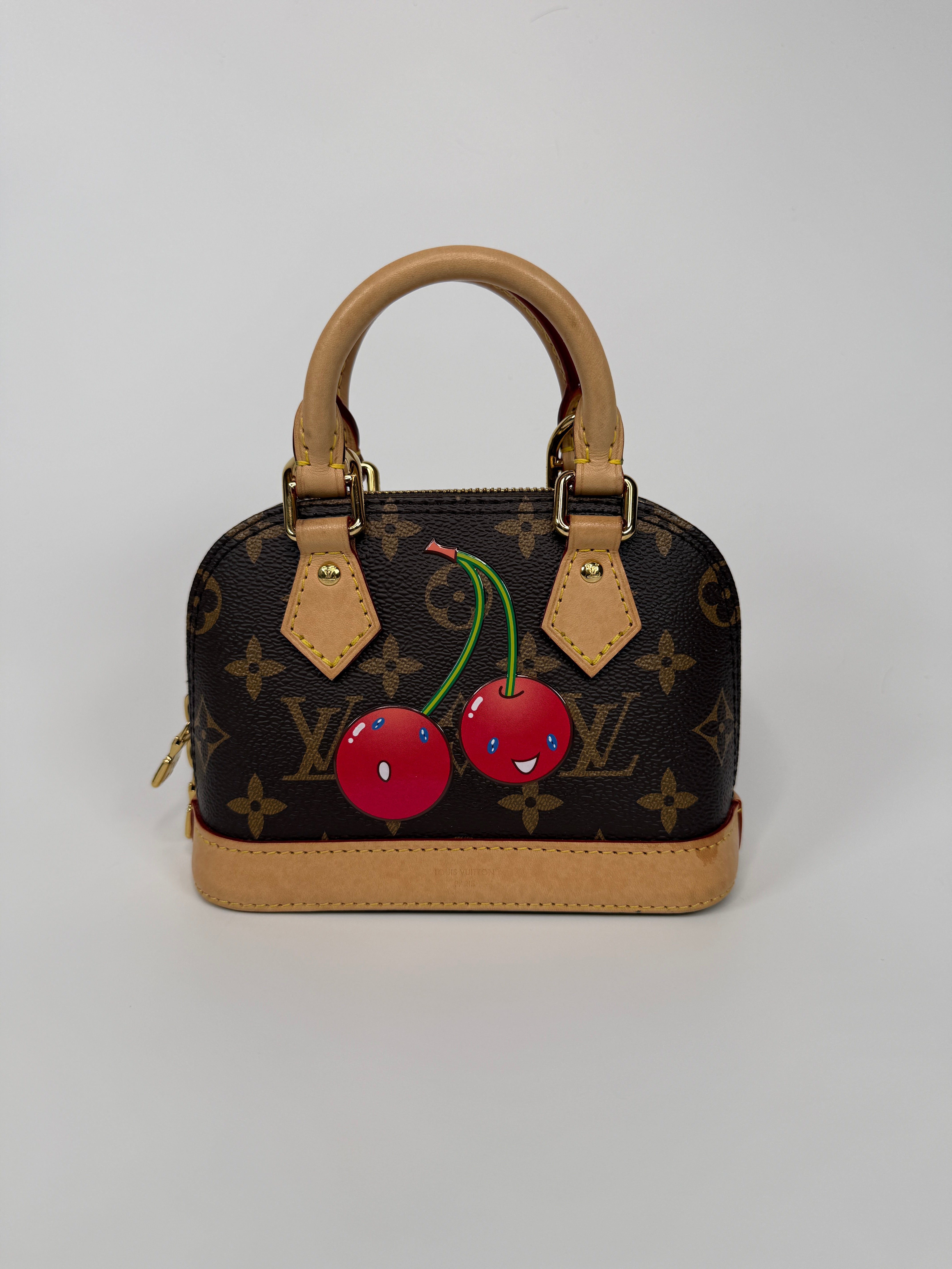 Authentic and preloved Louis Vuitton X Takashi Murakami Nano Alma Cherry Brown Monogram. Excellent condition. 100% Authenticity guarantee. Verified by Luxe Cheshire.