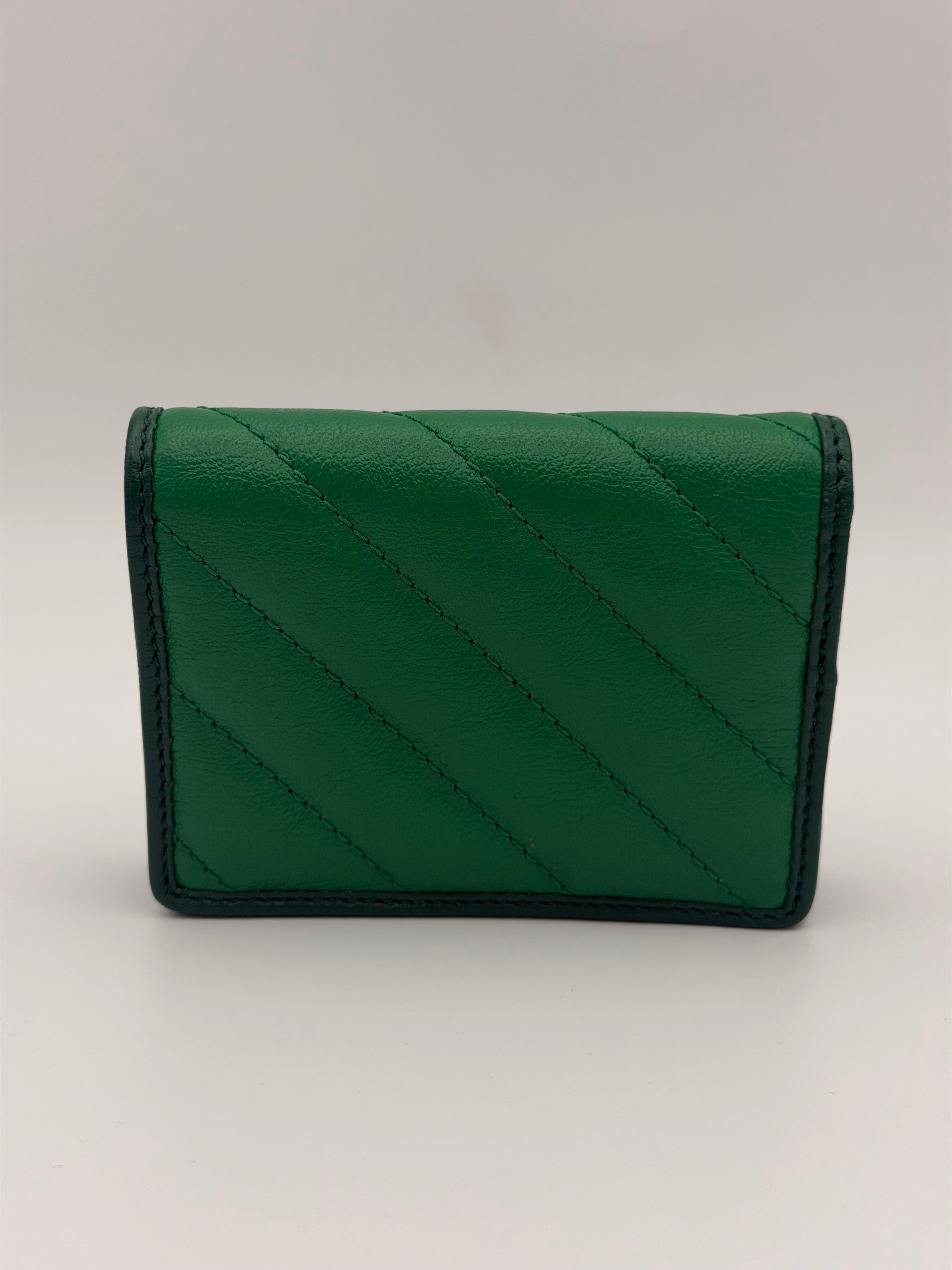Gucci GG Embossed Wallet In Grey Leather With Gold Hardware. Authentic and preloved in excellent condition. Insured next day delivery. Verified by Luxe Cheshire.
