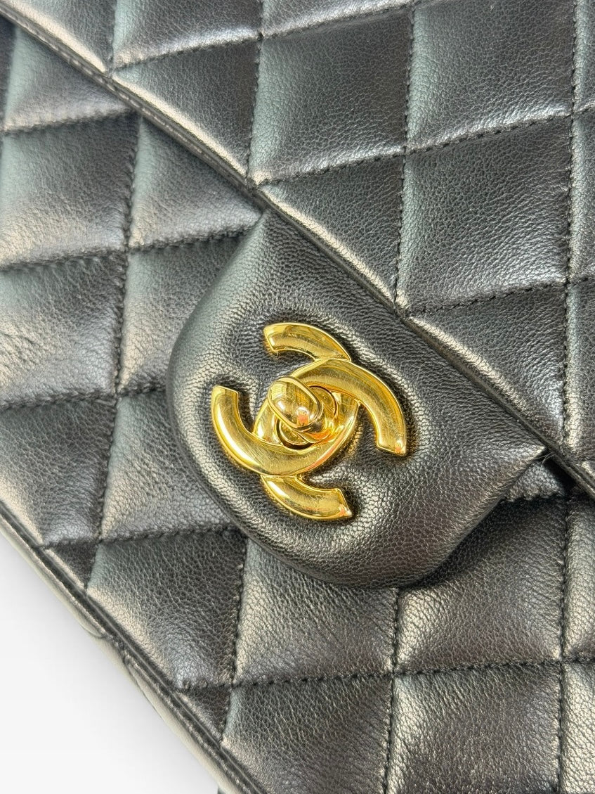 Chanel Medium Classic Double Flap In Black Lambskin Leather With Gold Hardware. 100% authentic and preloved in excellent condition