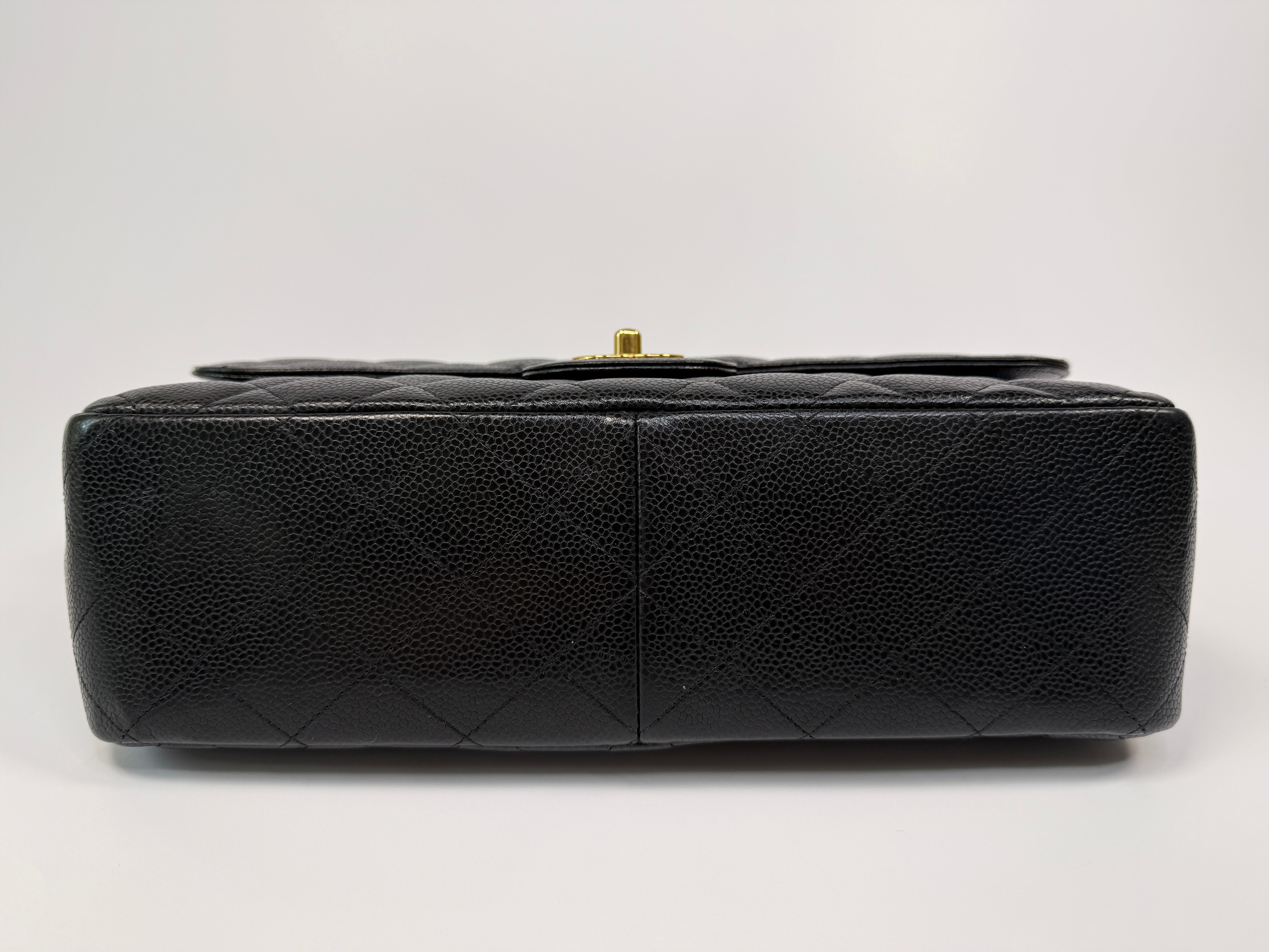 Chanel Classic Jumbo Flap Bag In Black Caviar LeatherWith Gold Hardware
Pre Loved & Authentic