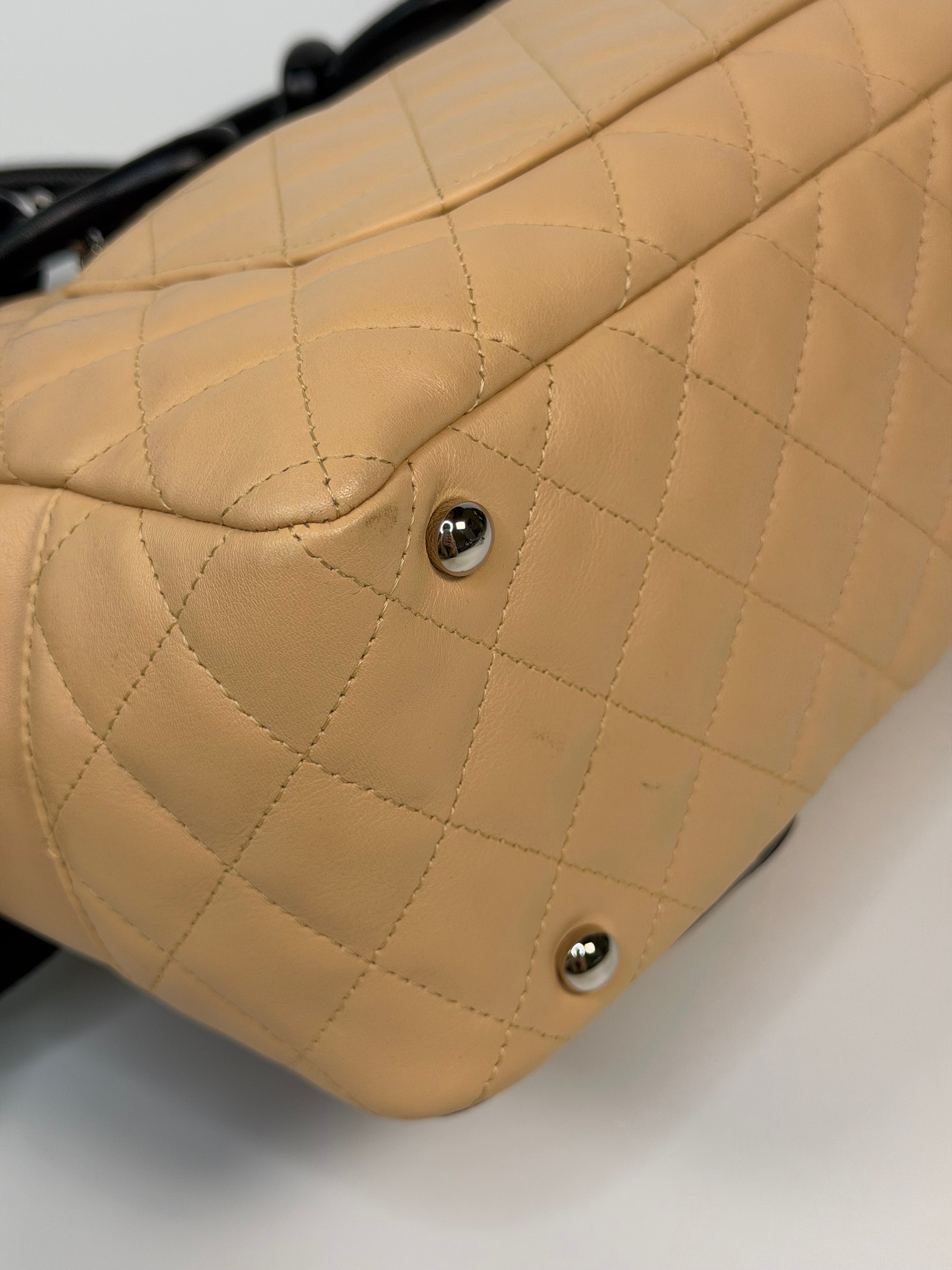 Chanel Cambon Bowling Bag In Beige / Black Leather With Silver Hardware. Authentic and preloved in excellent condition.